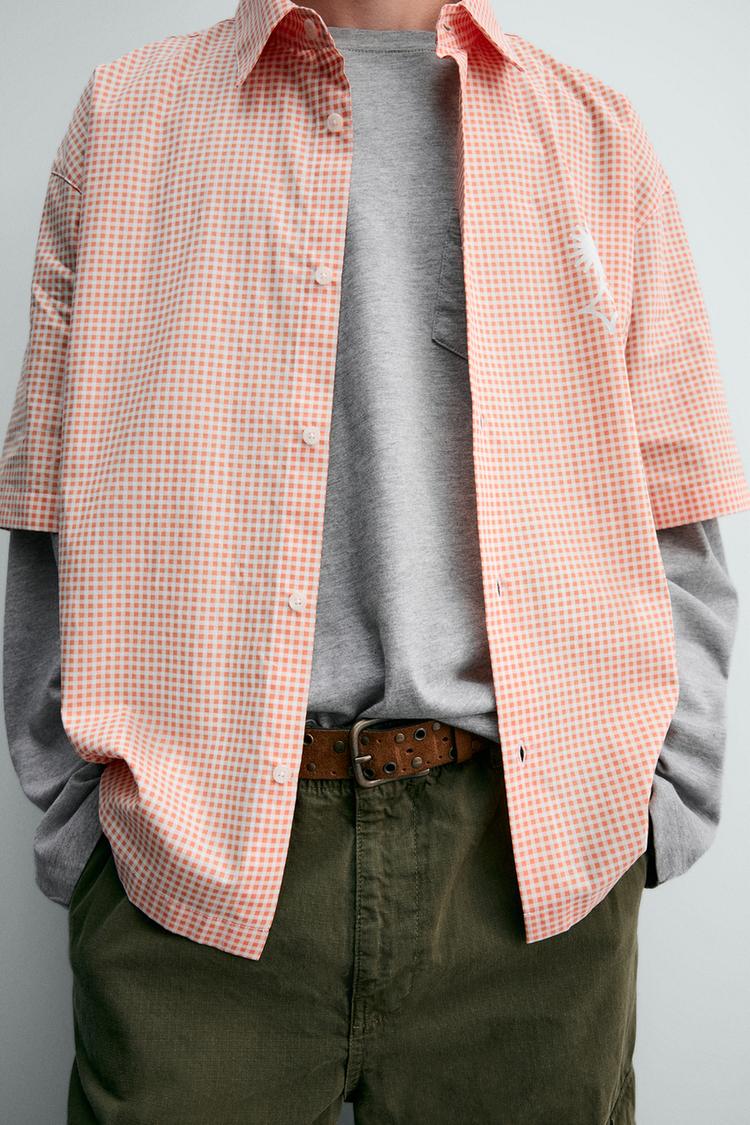 Camisa de corte boxy con estampado de eslogan 6