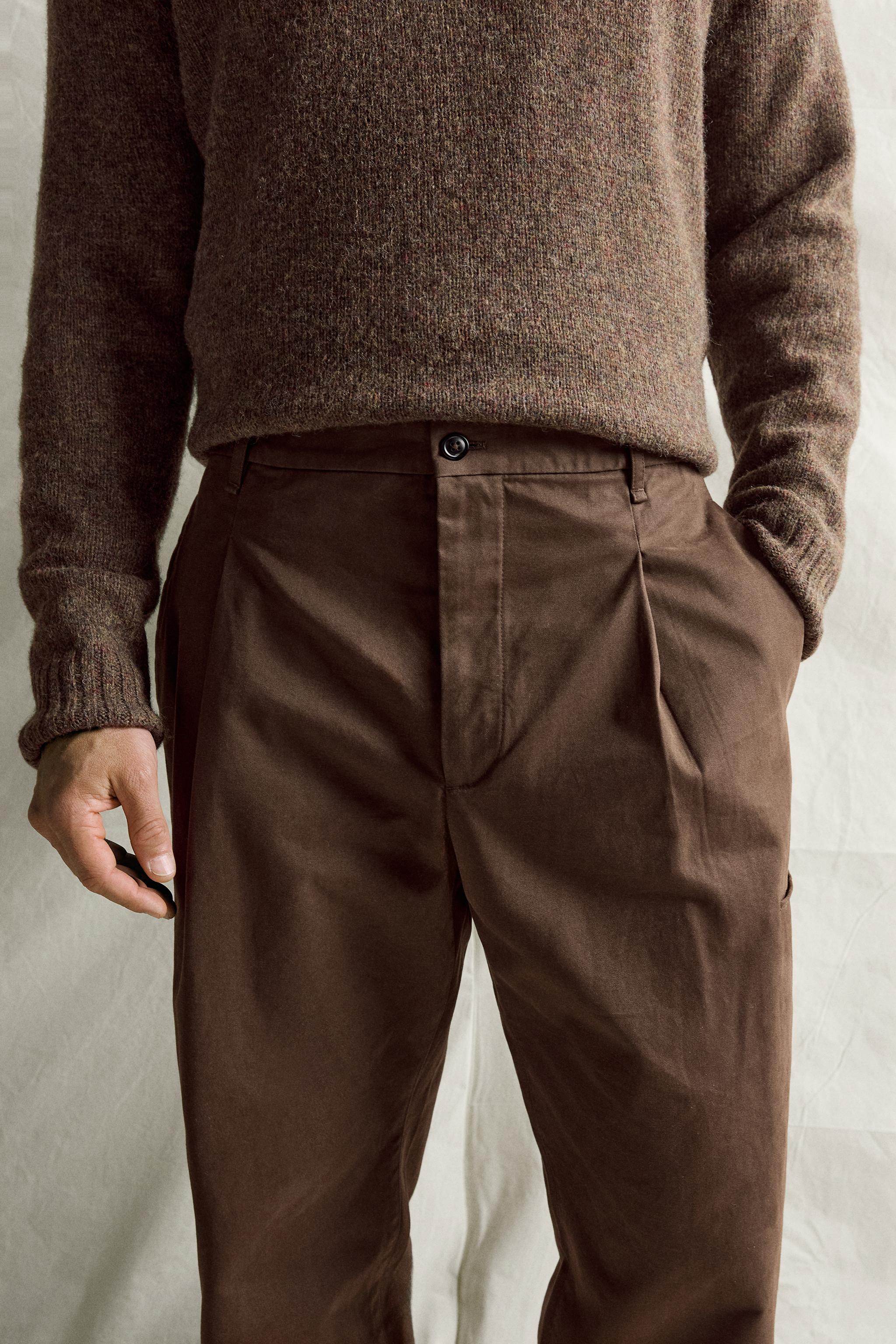 RELAXED FIT PLEATED PANTS