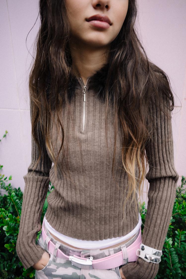 Jersey punto cremallera cuello efecto pelo