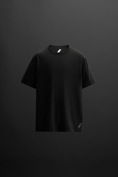 CAMISETA DE TREINO COM MISTURA DE ALGODÃO - Preto da Zara