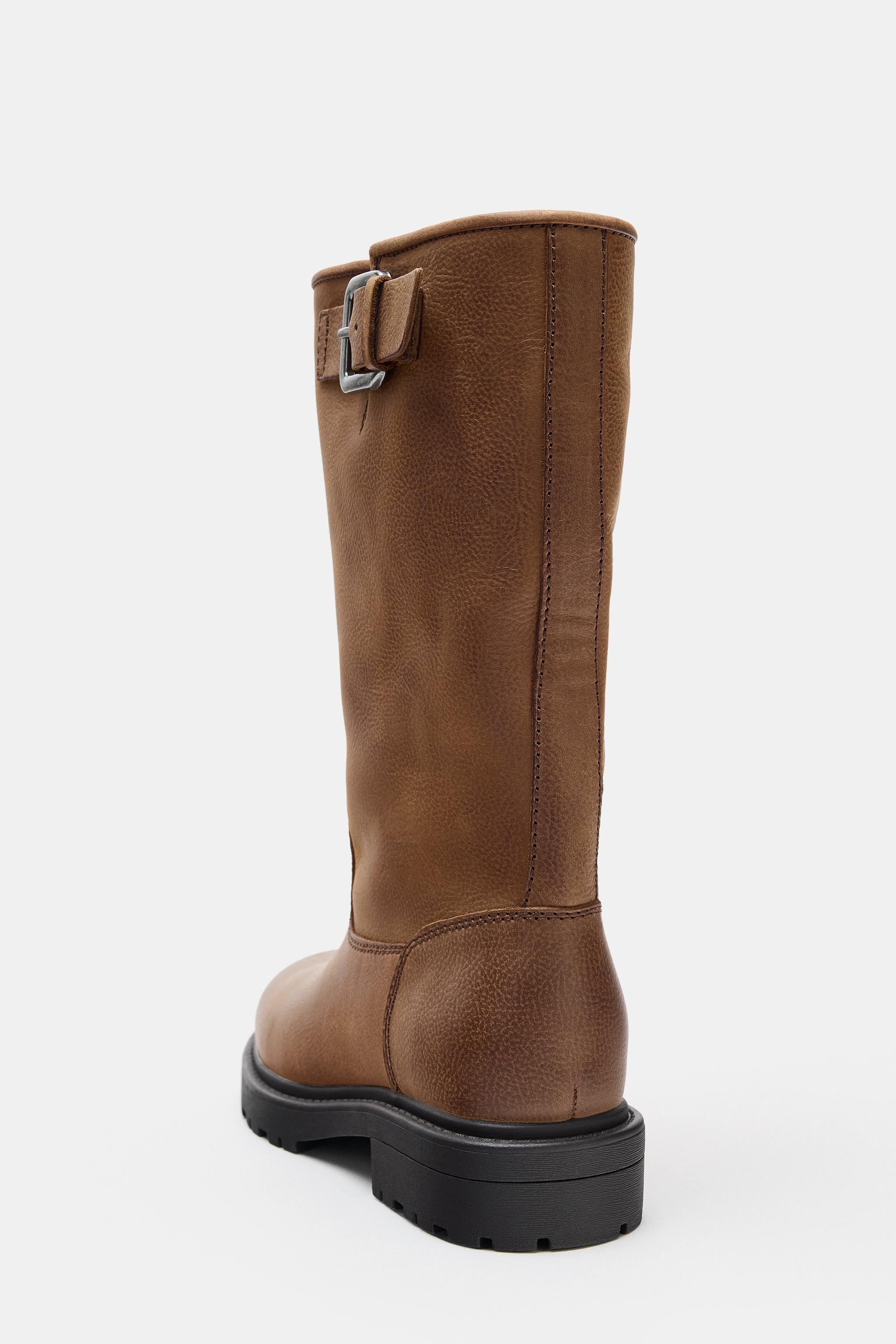 BOTTES EN CUIR À BOUCLE