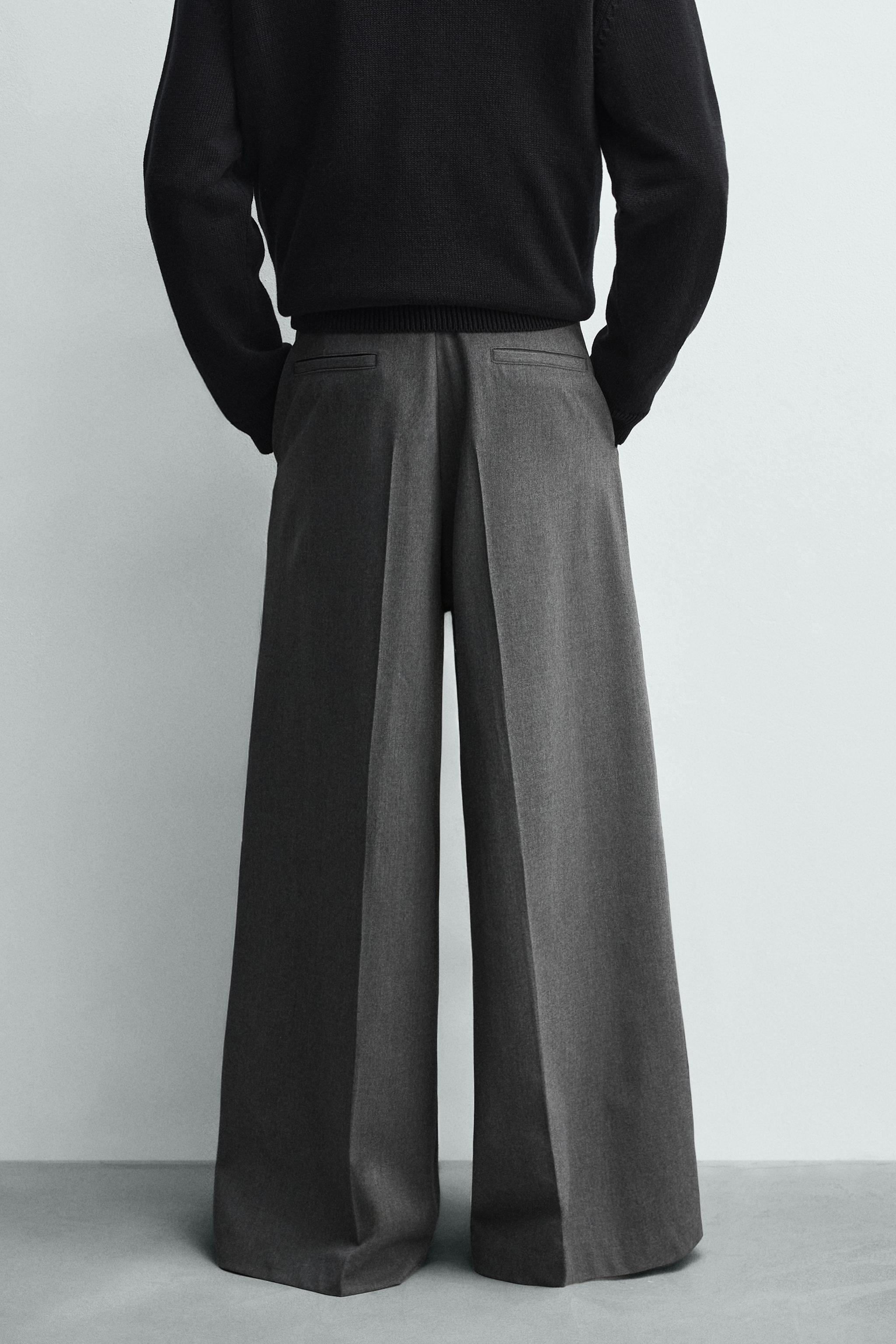 PLEATED WIDE FIT PANTS