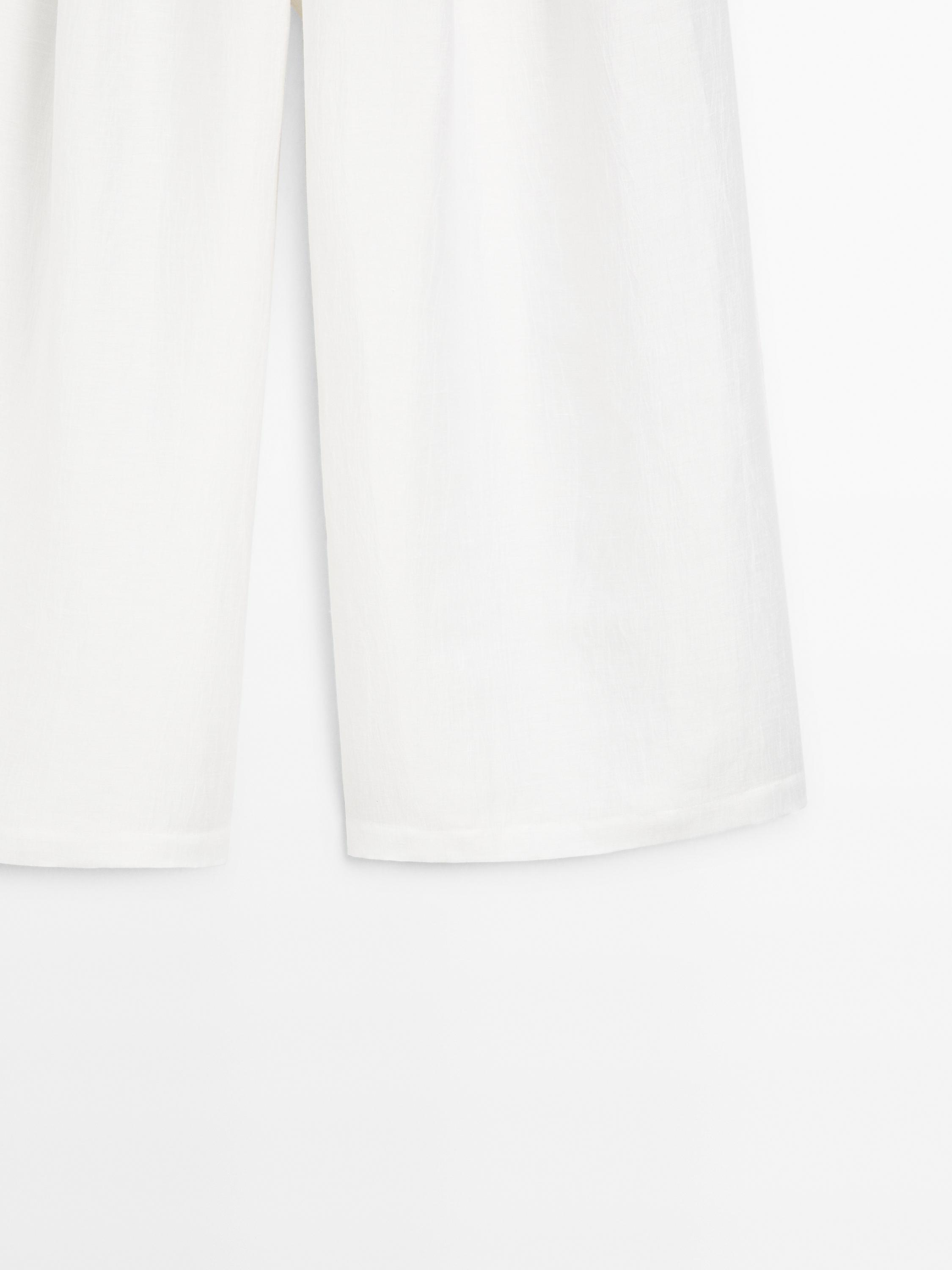 Wide-leg voluminous linen blend trousers