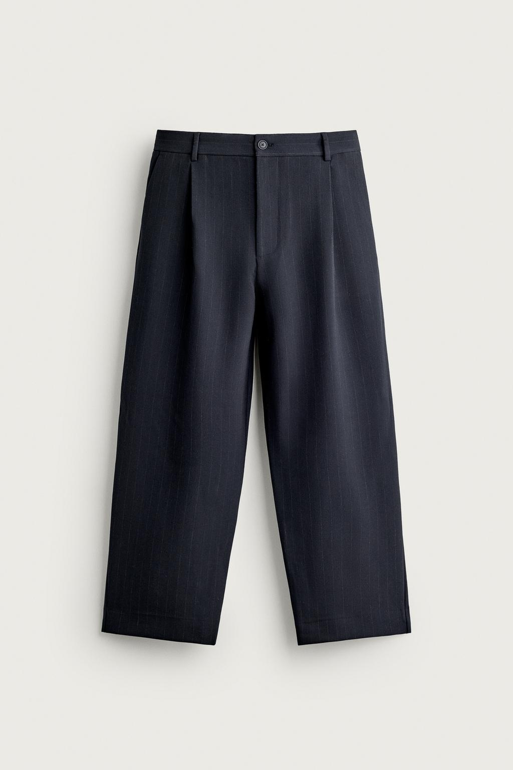 RELAXED FIT PLEATED TROUSERS