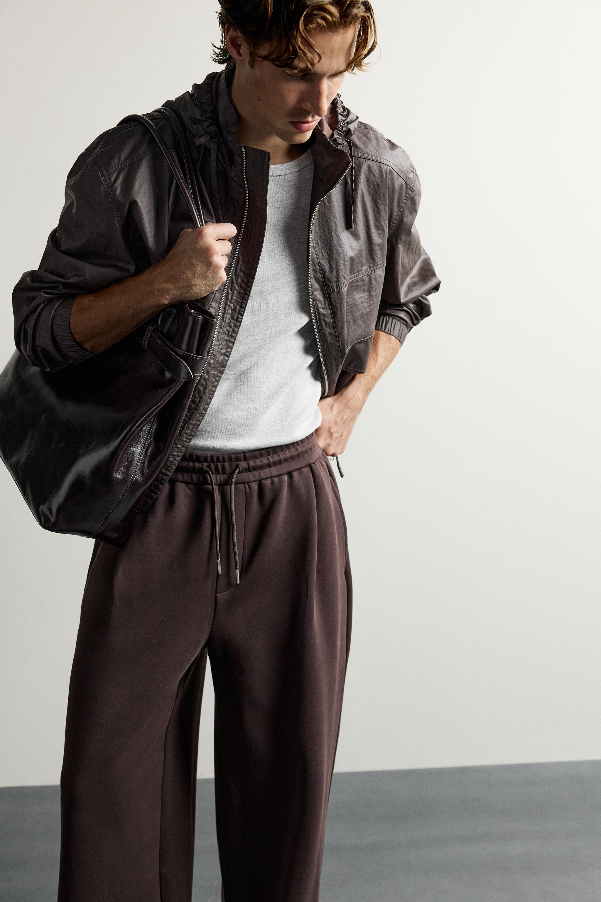 PLEATED BALLOON-FIT PANTS