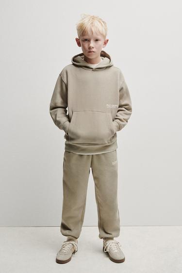 PANTALÓN JOGGER TEXTO - Beige de Zara