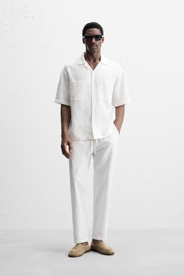 بنطلون RELAXED FIT قطن - كتان - أبيض مكسور الخاص بـ Zara