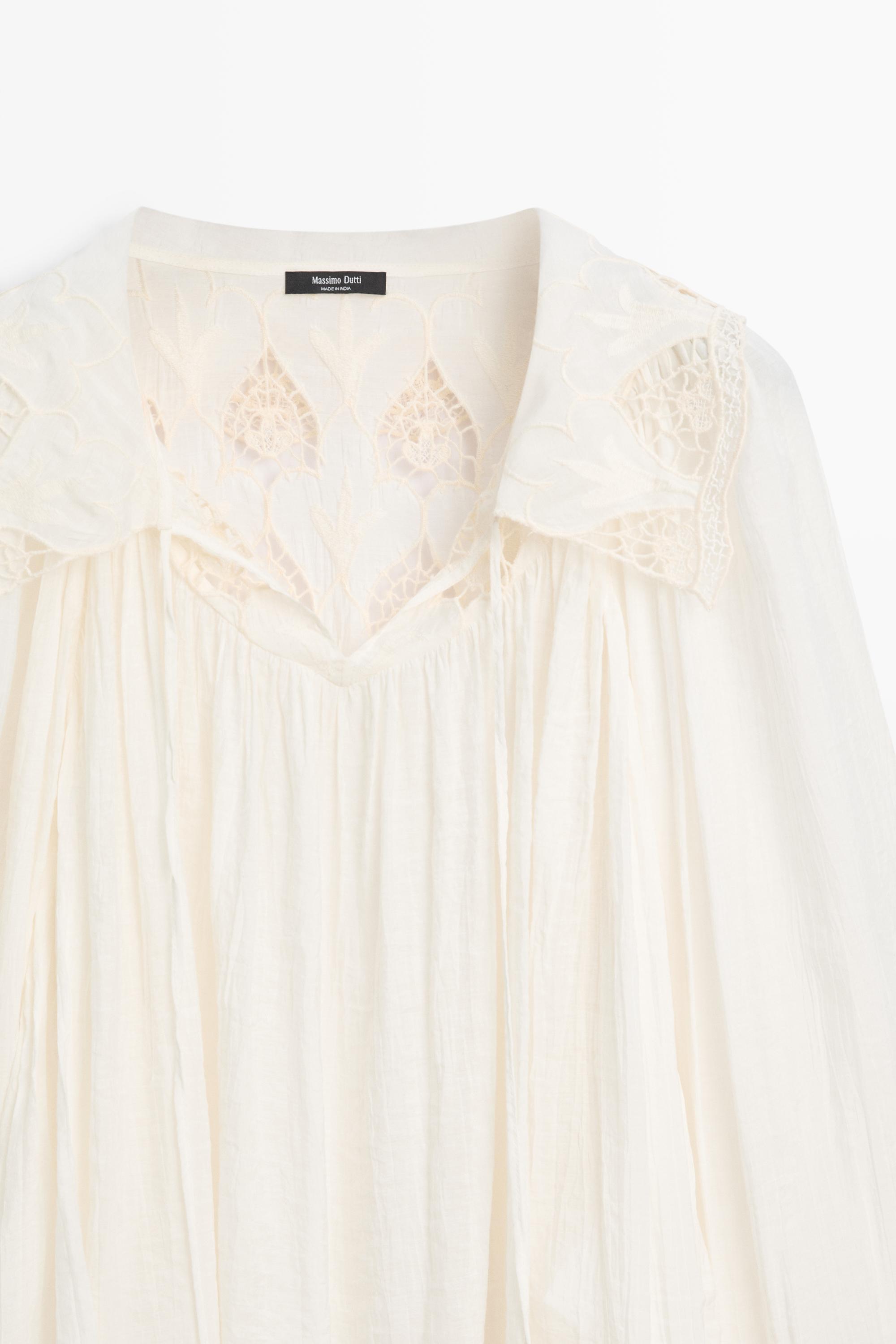 Embroidered flowing blouse