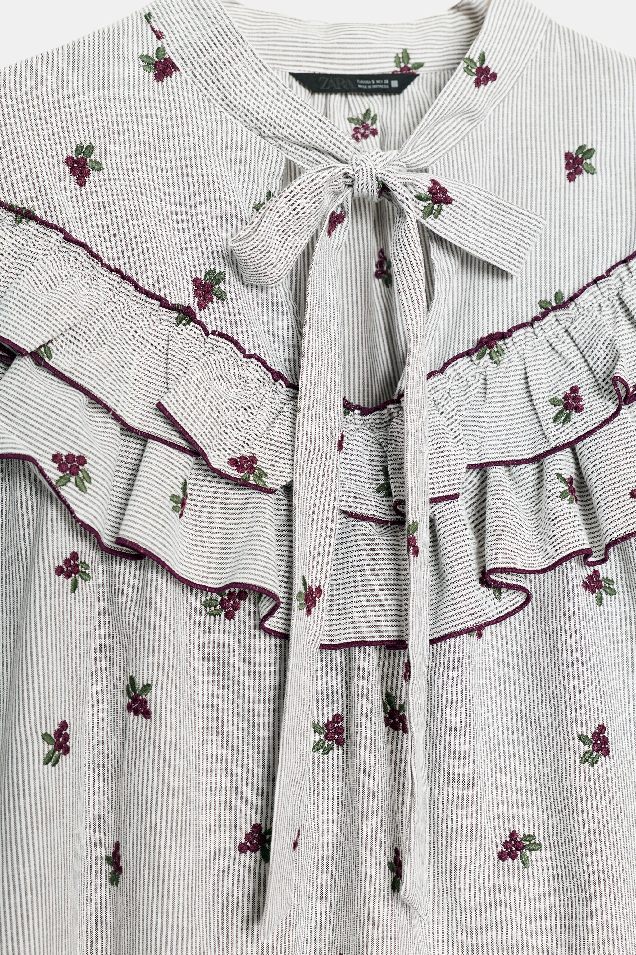 BLOUSE À VOLANTS ET BRODERIES