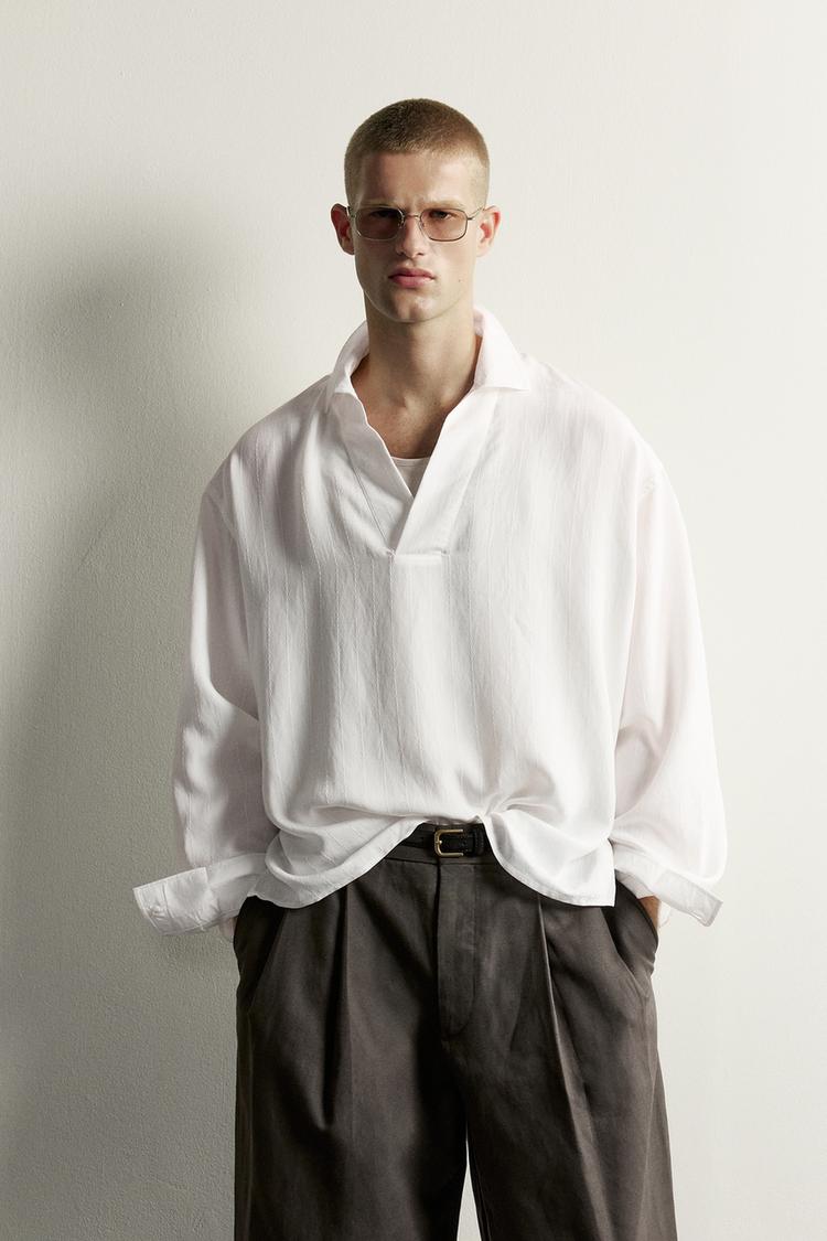RELAXED FIT STRIPED JACQUARD POLO SHIRT