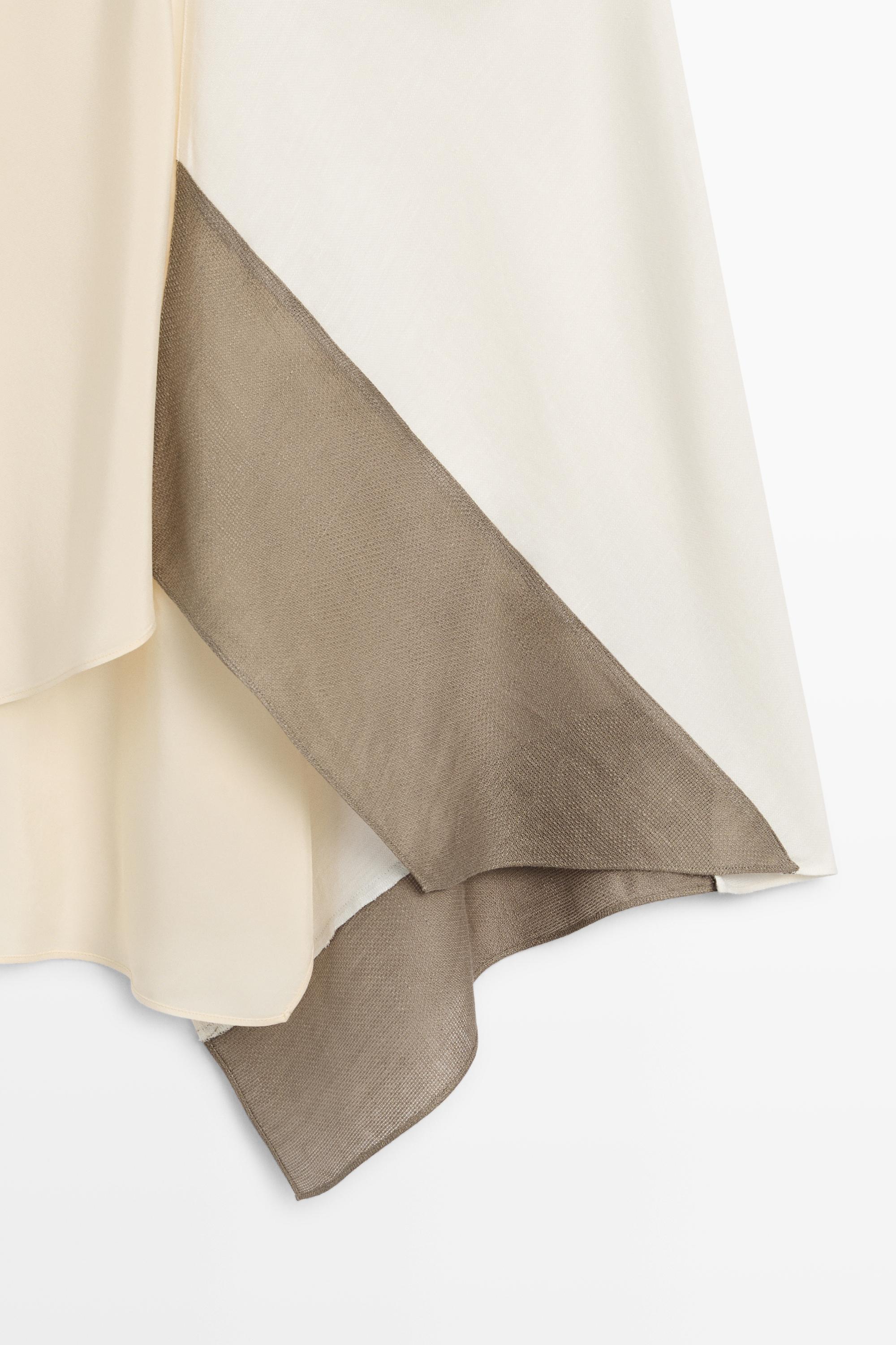 Top fluide asymétrique à fines bretelles