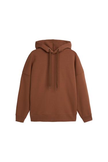 Front view of a brown hooded sweatshirt with drawstrings.