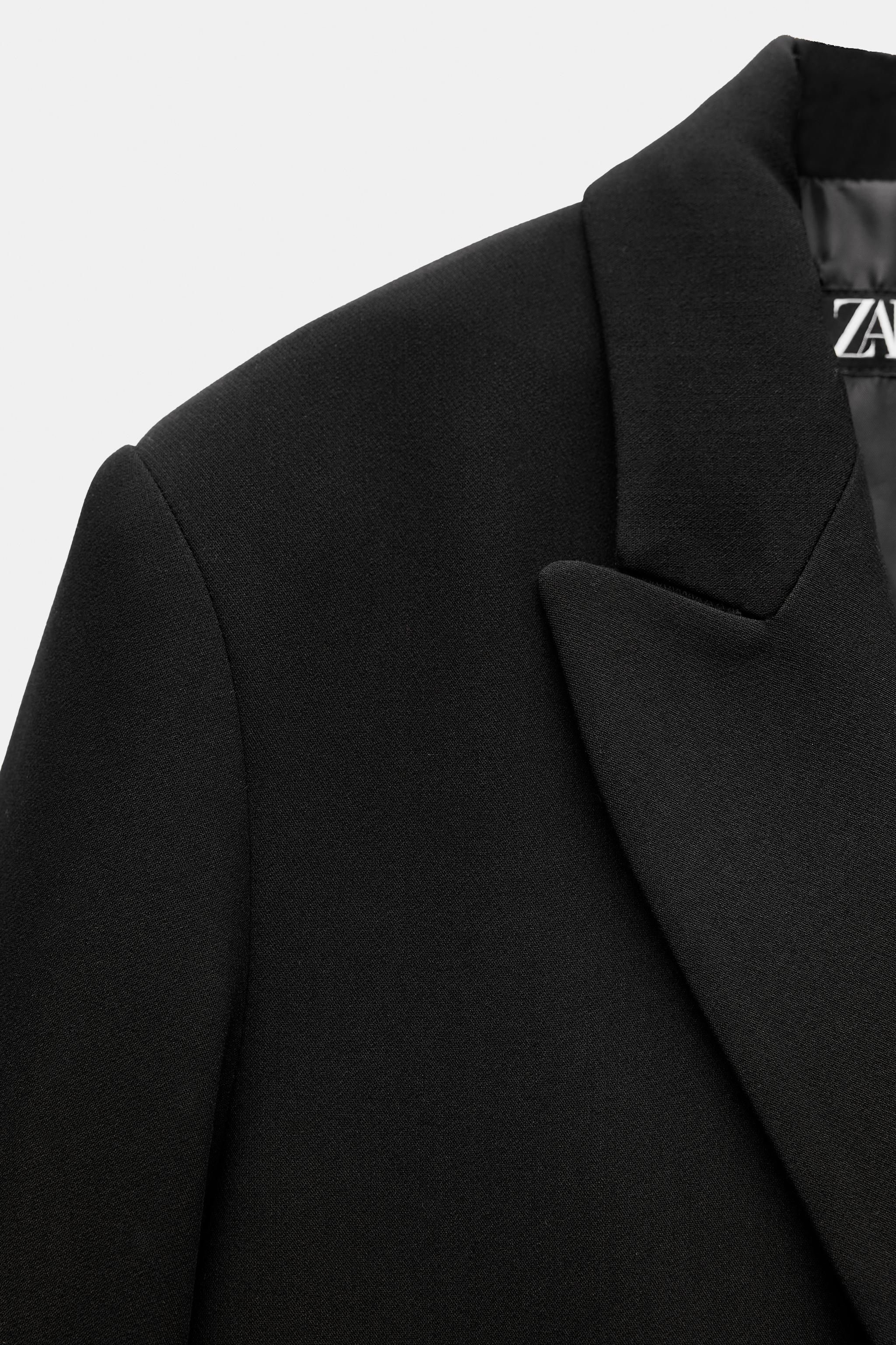 VESTE OVERSIZE À BOUTONNAGE CROISÉ