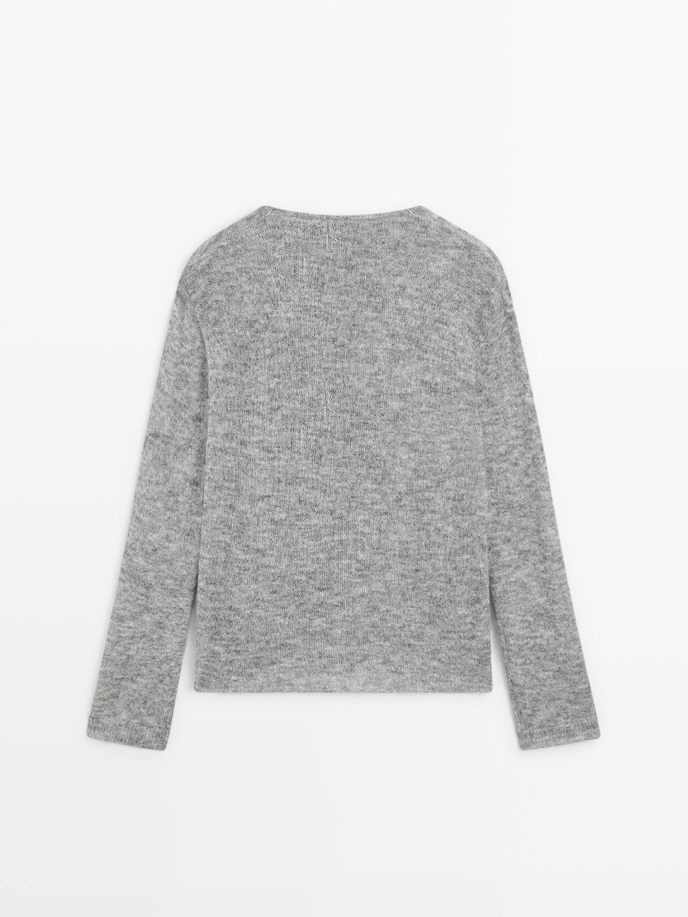 Pull en maille à col drapé