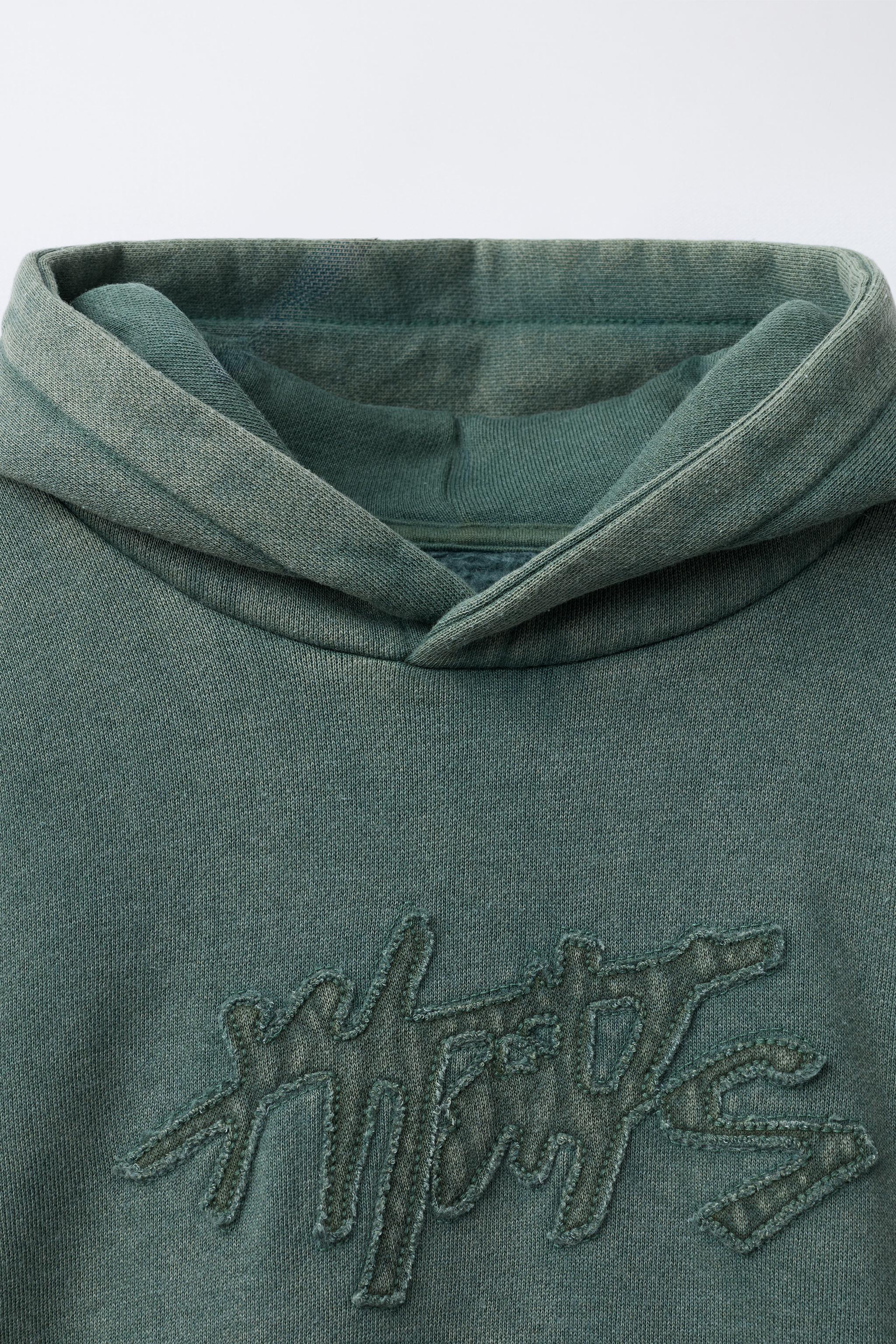 DOUBLE SLEEVE WASHED EFFECT SWEATSHIRT