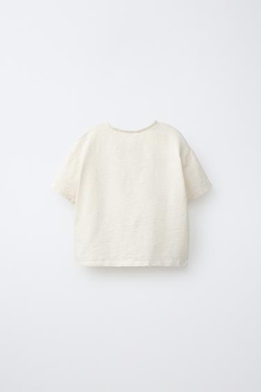 T-SHIRT EN MATIÈRES VARIÉES AVEC POCHE - Écru de Zara - Image 1