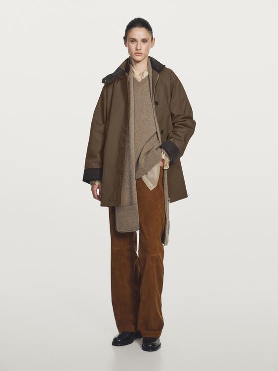 Waxed high neck parka with corduroy detail