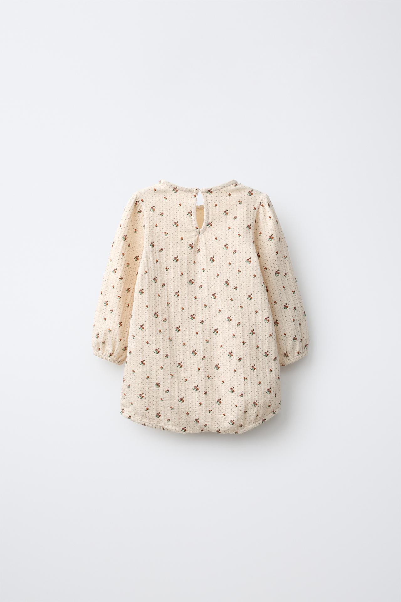 TEXTURED FLORAL ROMPER — Ecru