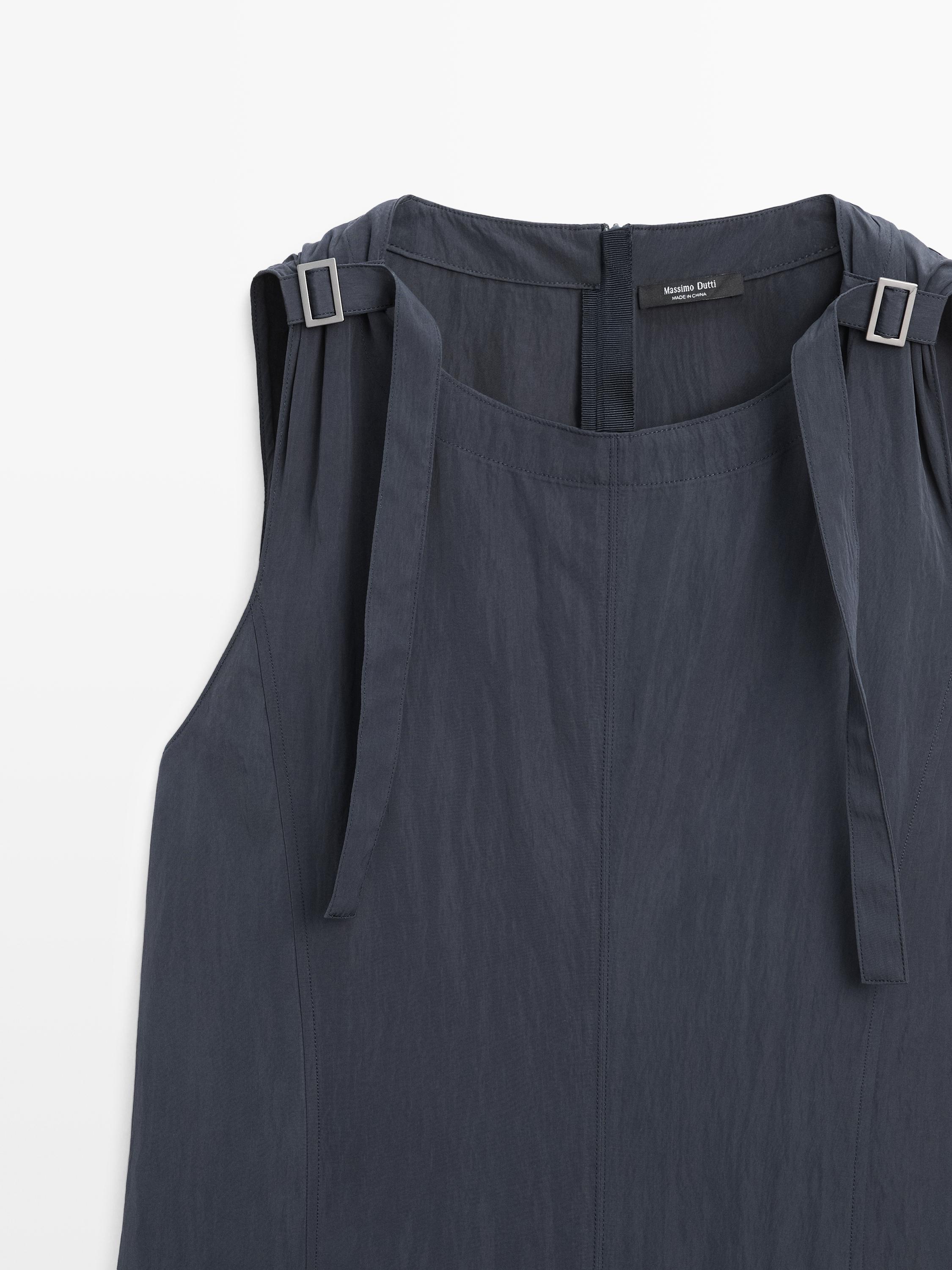 Flowing midi dress with buckles