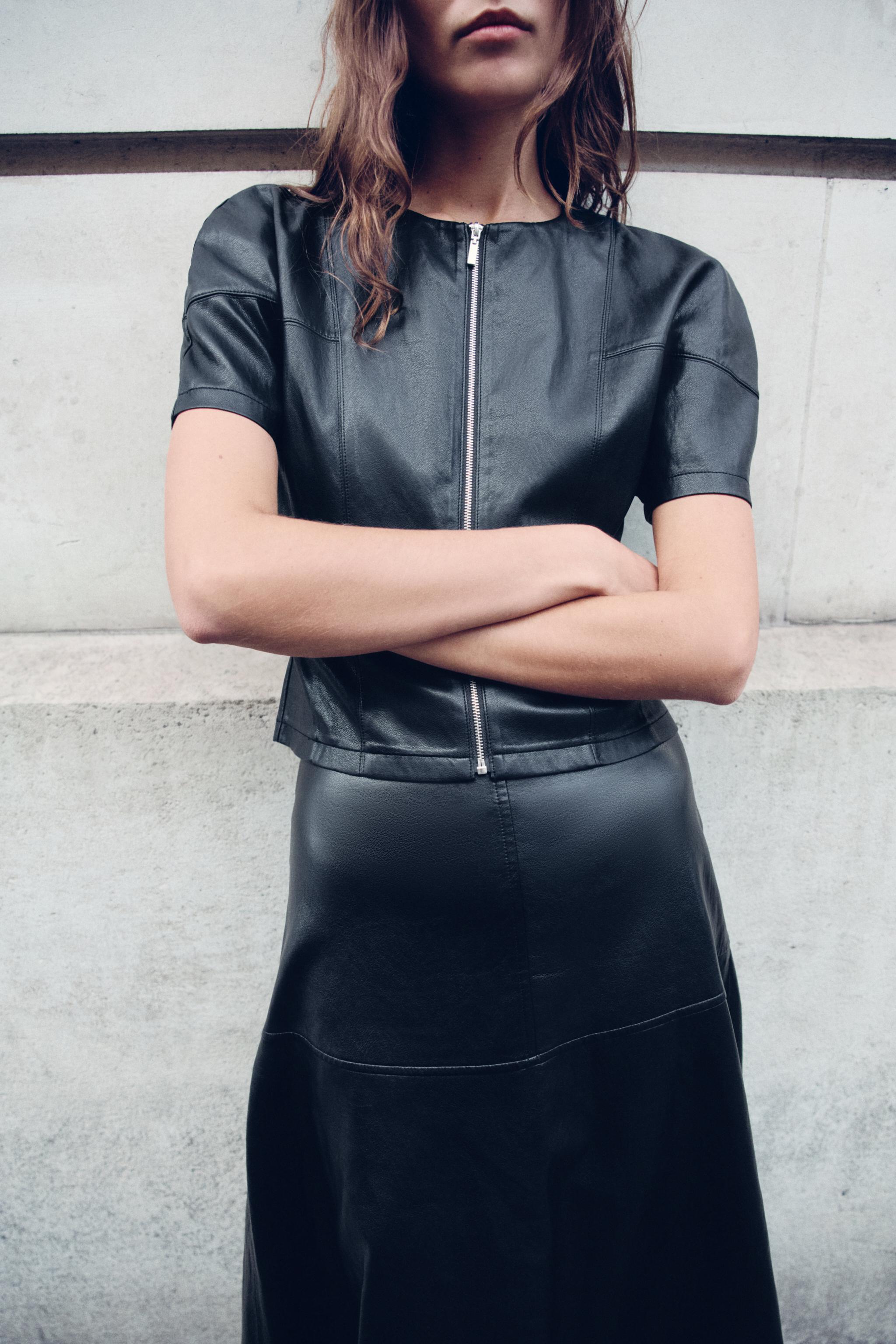 TOP MATIÈRE SYNTHÉTIQUE ZIP