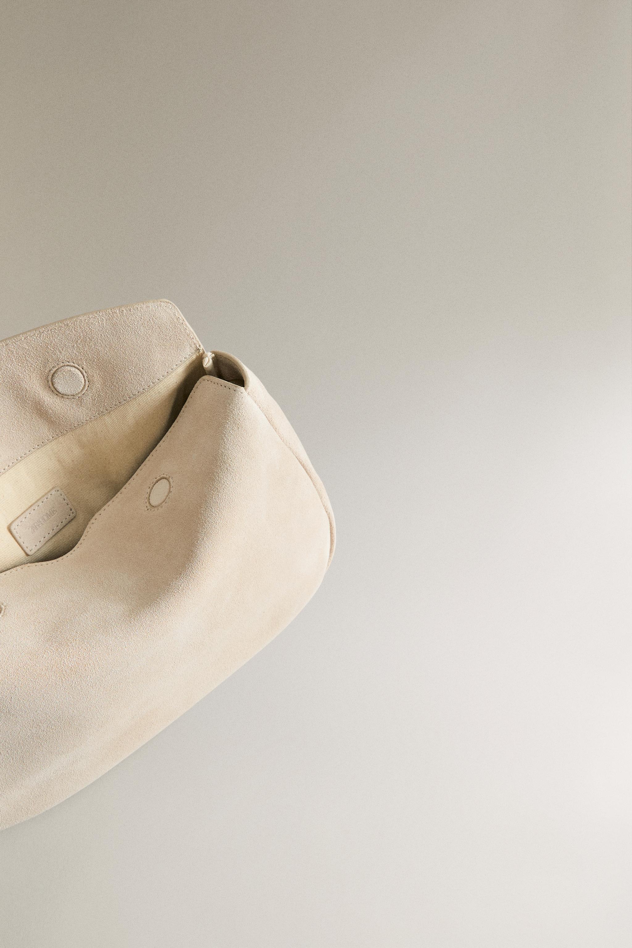 SPLIT SUEDE CLUTCH MAKEUP BAG