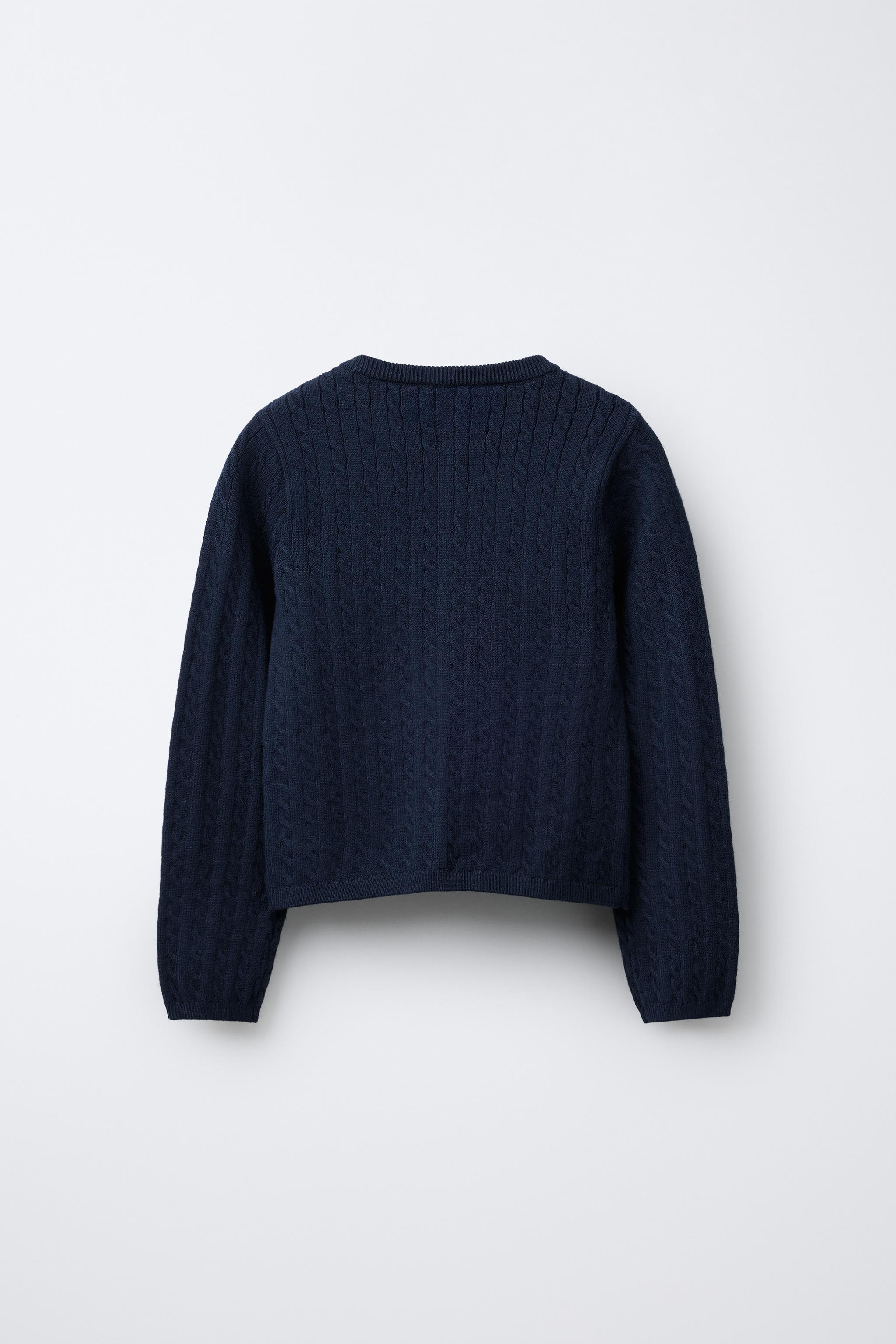 GILET EN MAILLE TORSADÉE