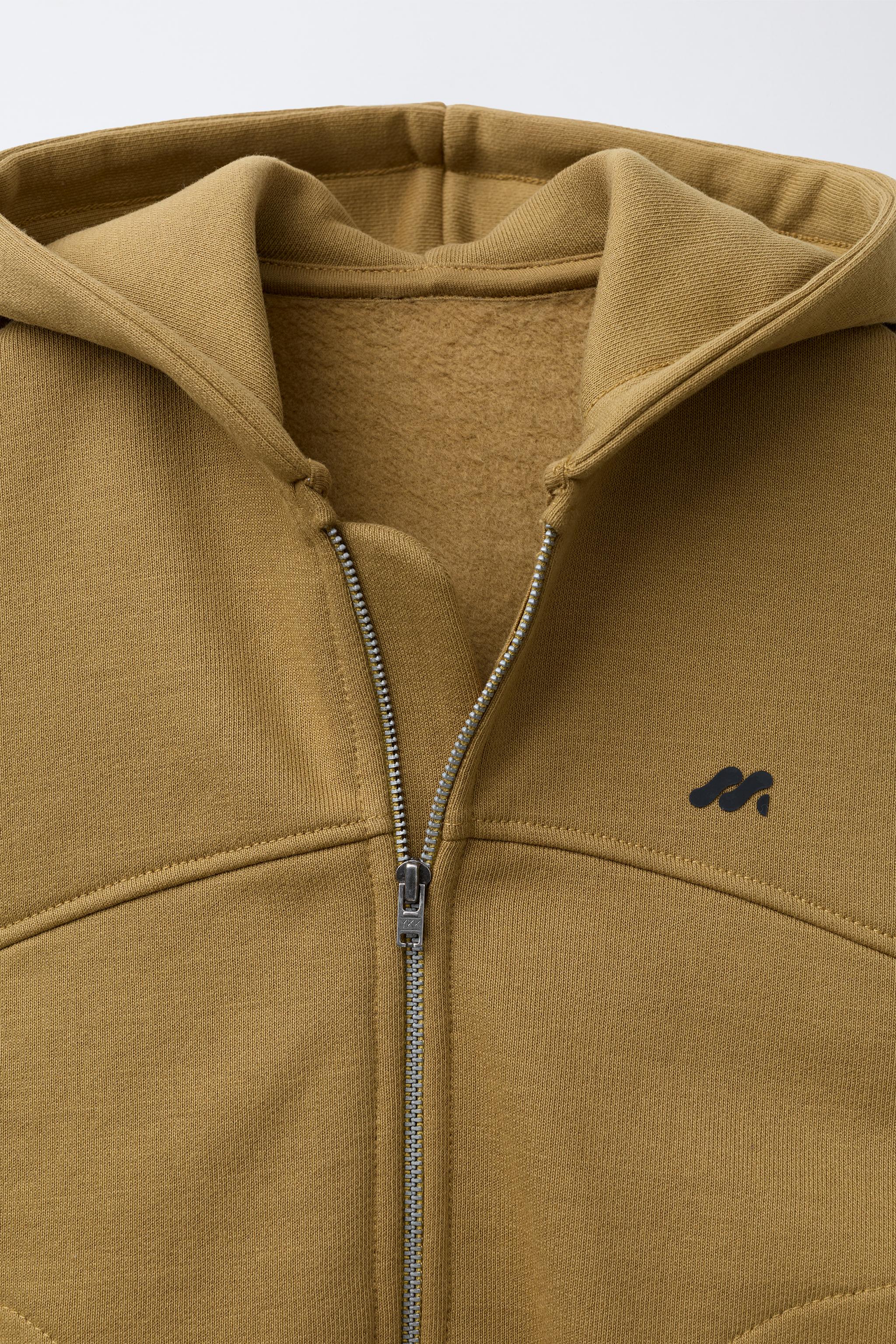 EMBOSSED LOGO ZIP-UP HOODIE