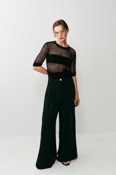 PANTALÓN PALAZZO BOTÓN DORADO - Negro de Zara