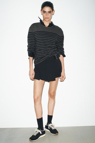 ZAPATILLA RUNNING CONTRASTE - Negro de Zara