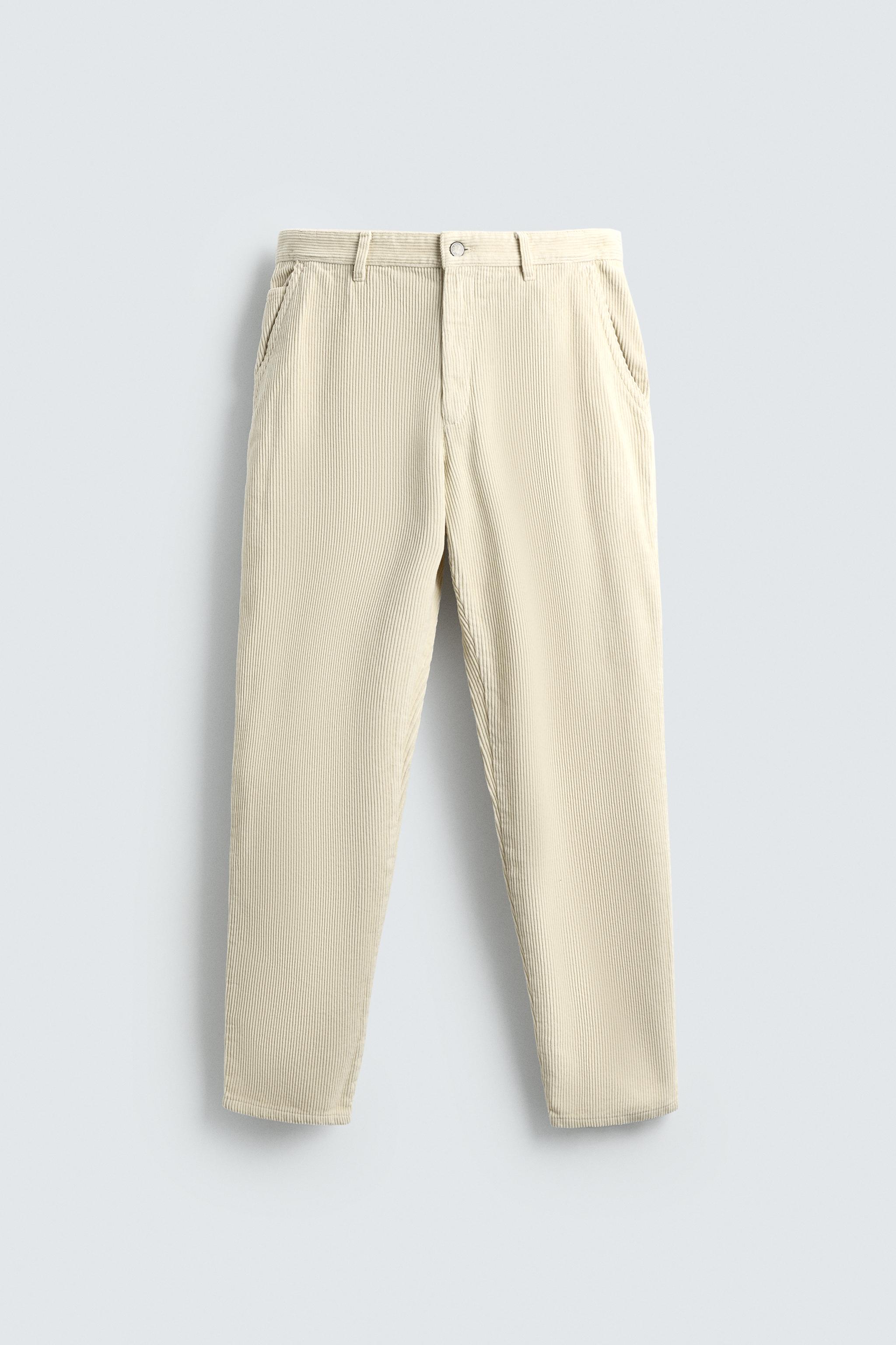 CARROT FIT CORDUROY TROUSERS — Ecru