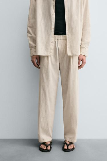 CALÇA RELAXED FIT LISTRADA - Manteiga da Zara