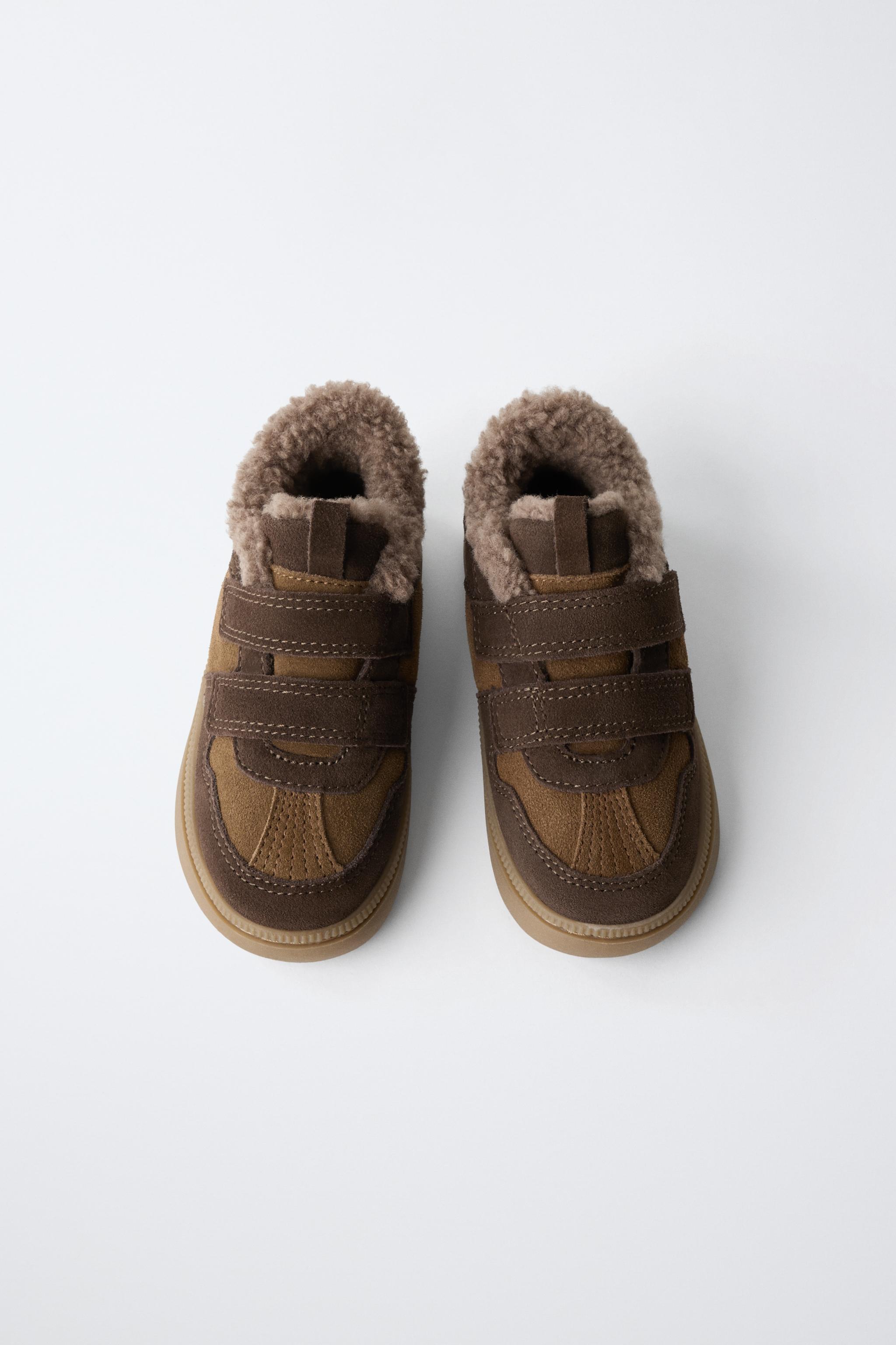 BASKETS MONTANTES EN CUIR