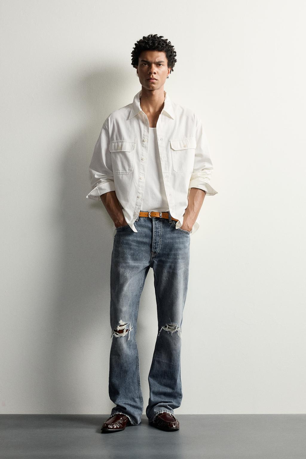 RIPPED FLARE FIT JEANS