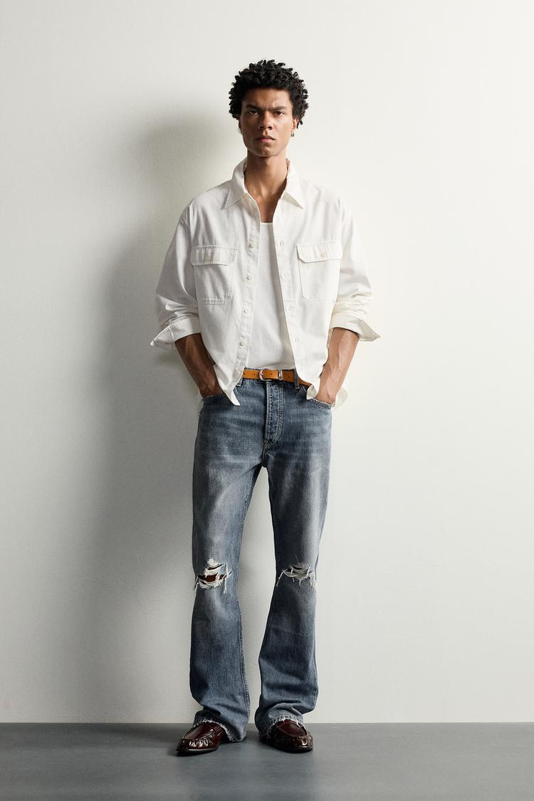 RIPPED FLARE FIT JEANS