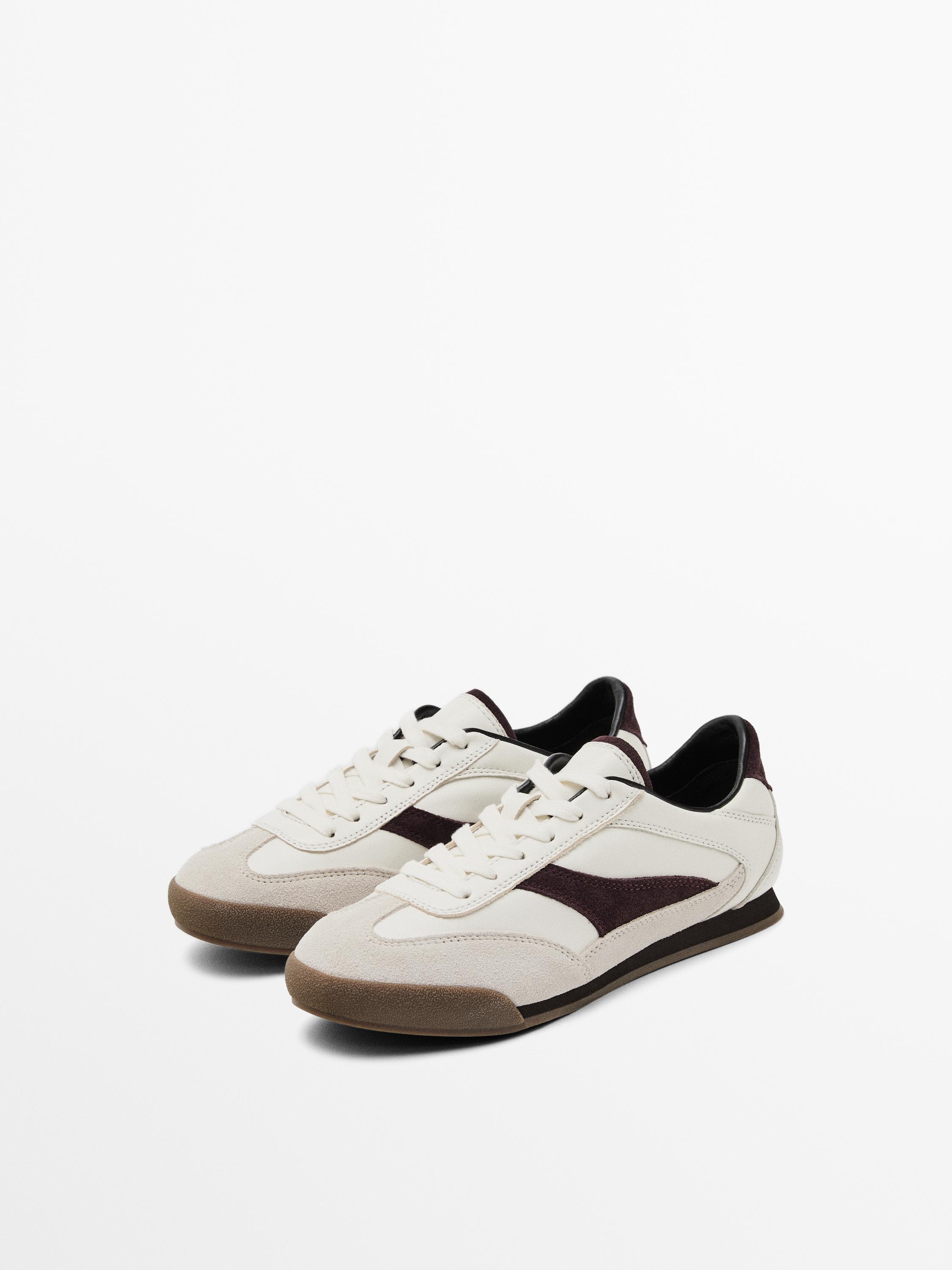 Tennis cuir contrastant