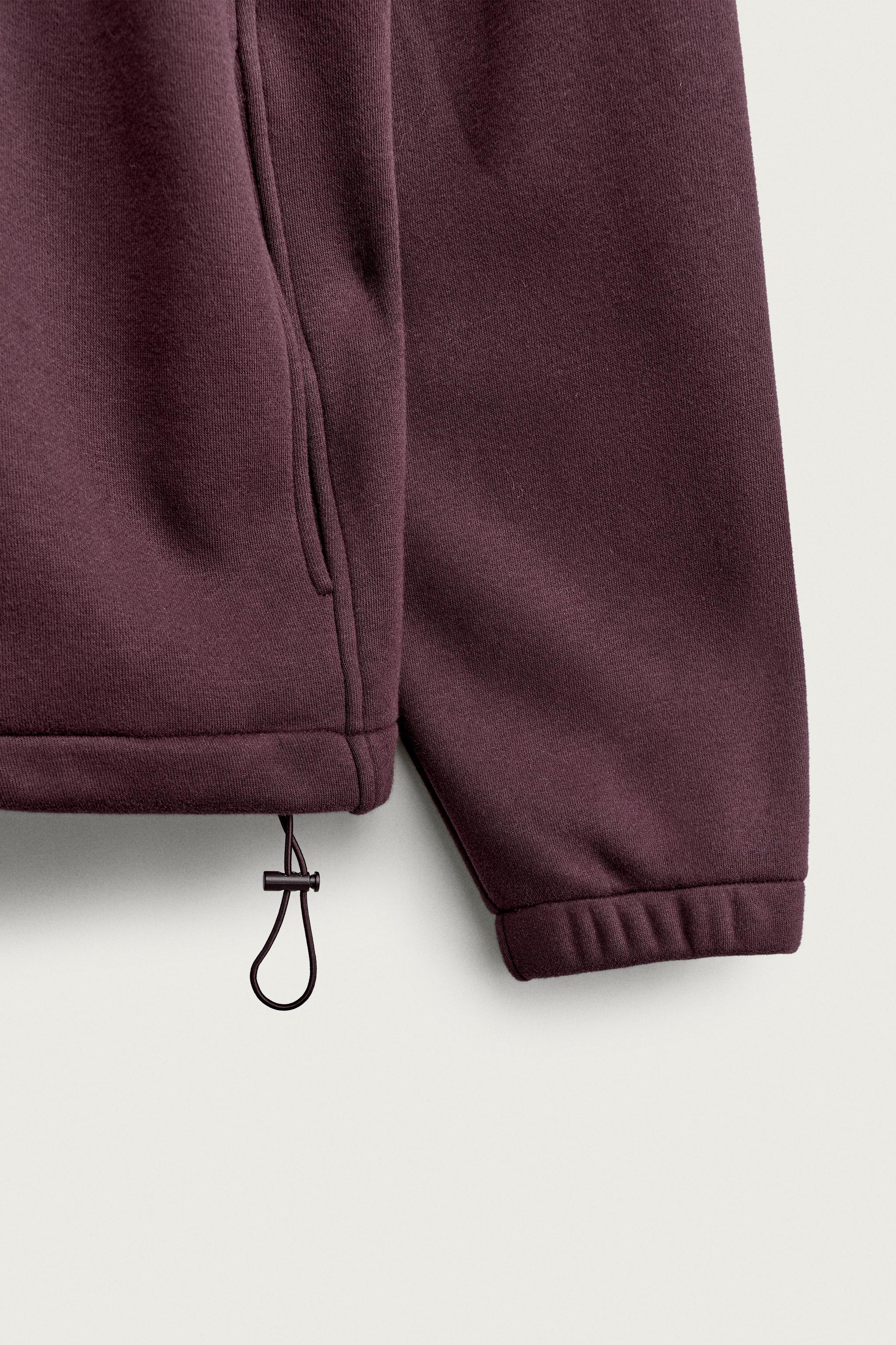QUARTER-ZIP SWEATSHIRT