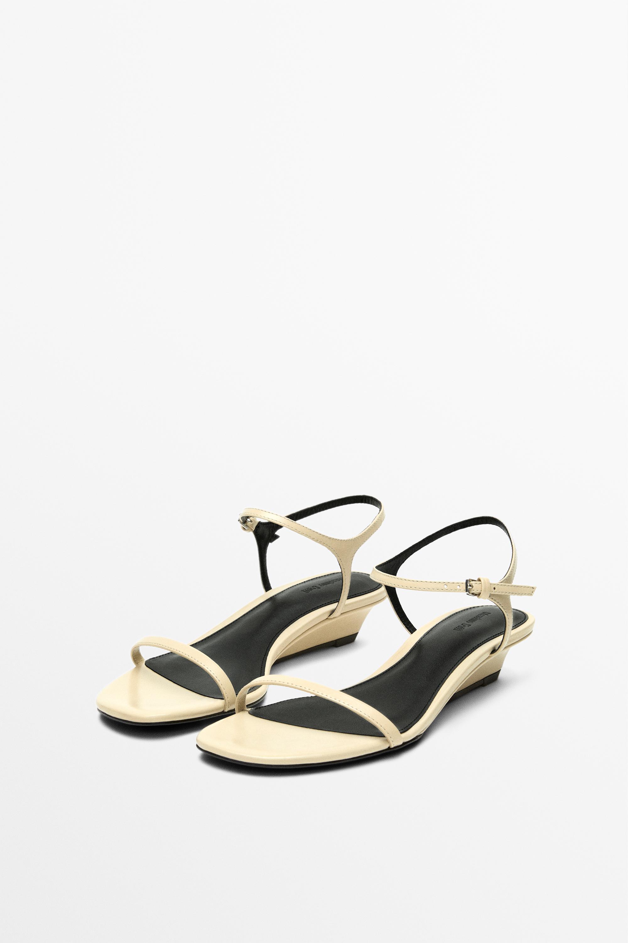 Sandale en cuir à brides compensées