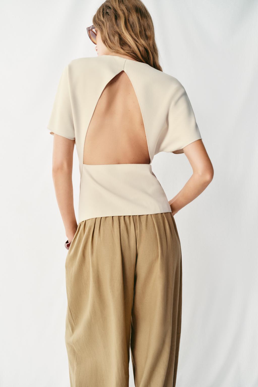 SHORT SLEEVE CUT-OUT TOP