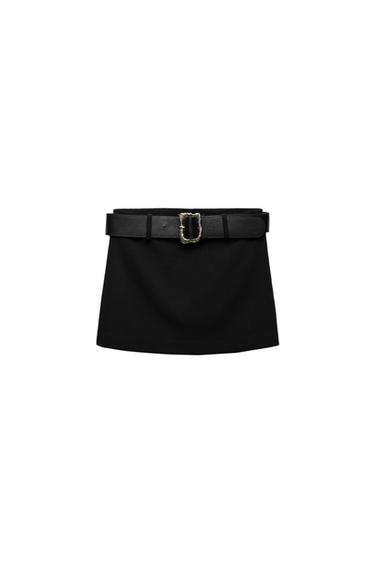Front view of a black miniskirt with a wide belt and metal buckle.
