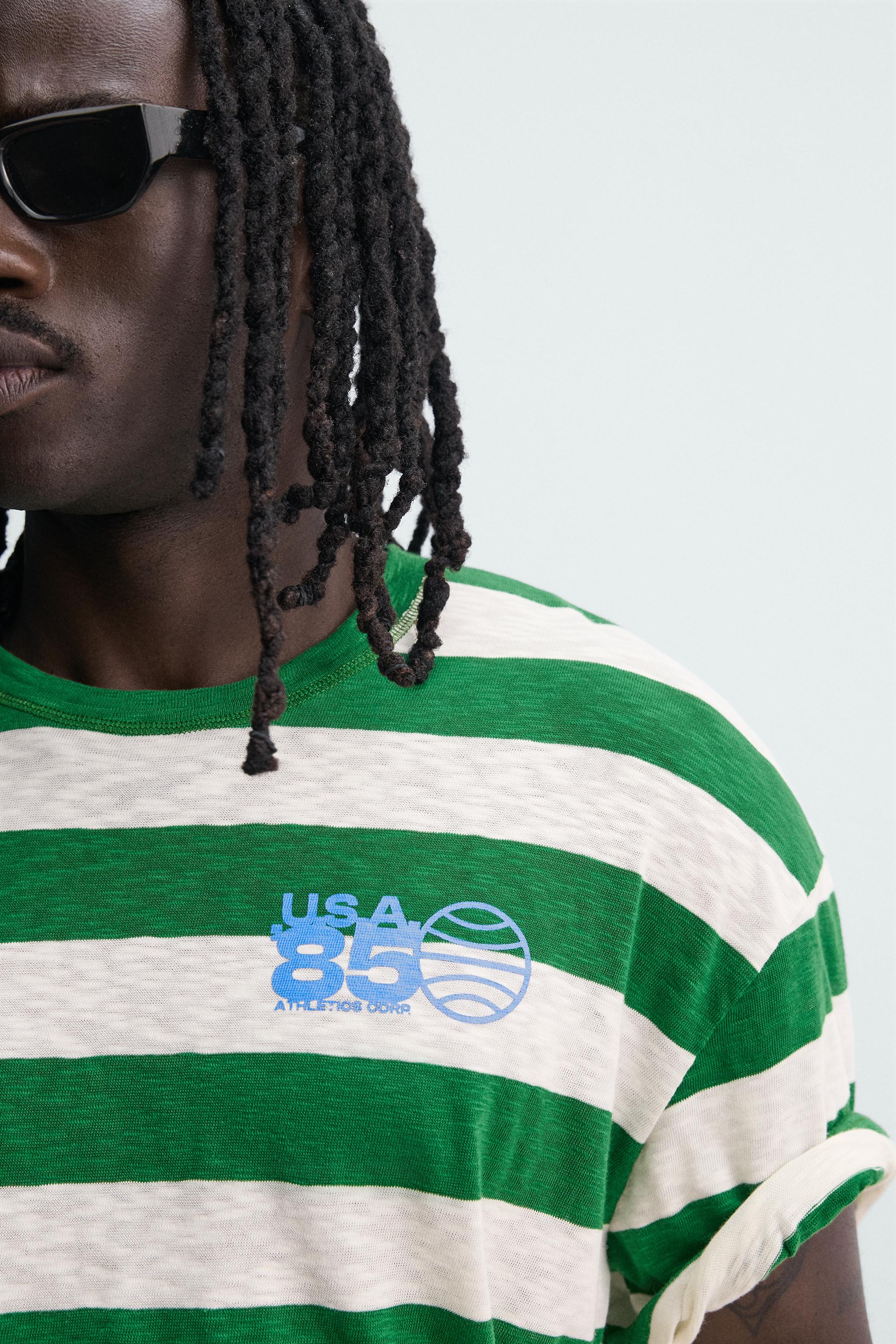T-SHIRT À RAYURES AVEC IMPRIMÉ EN CONTRASTE