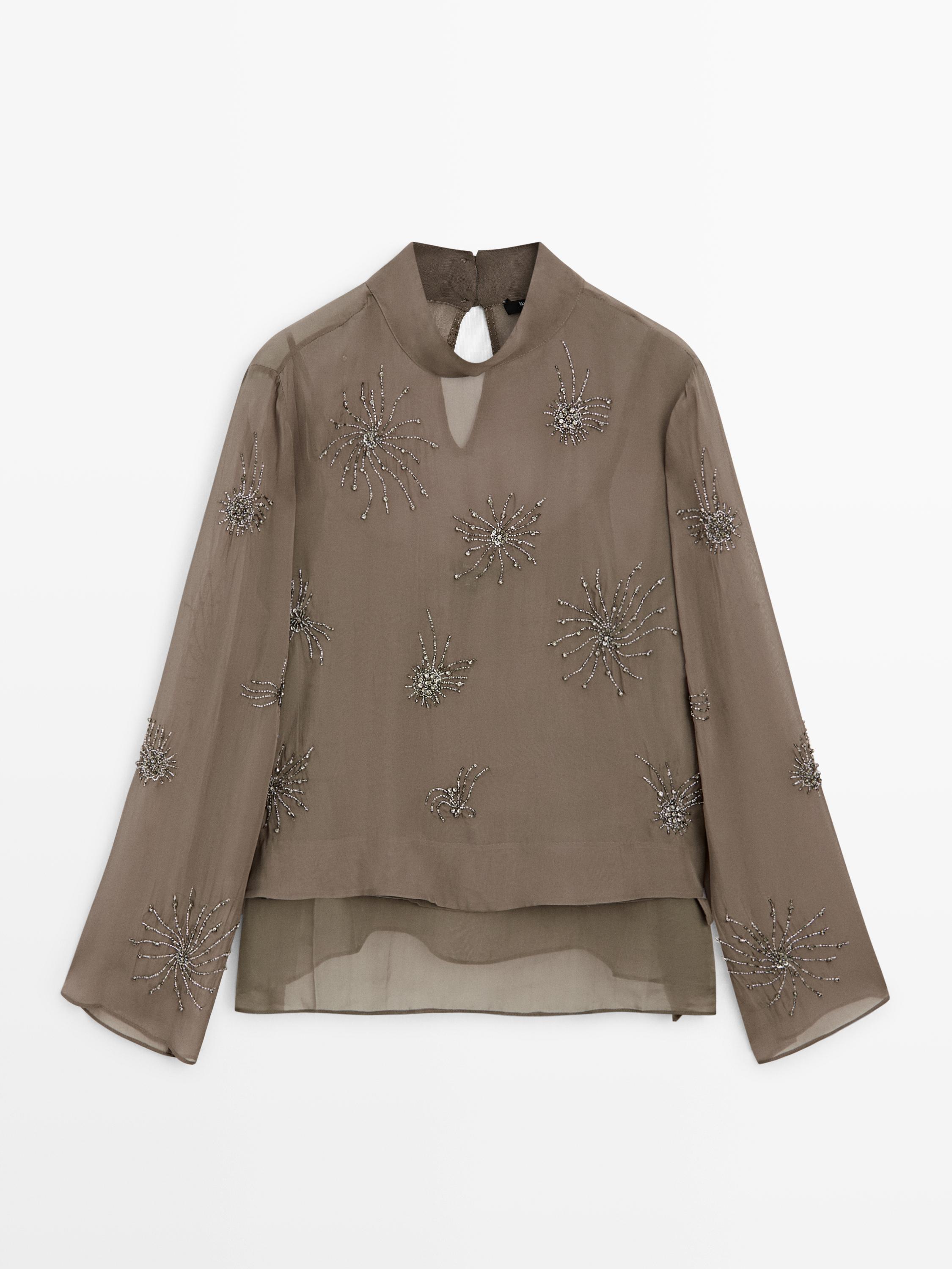 Embroidered semi-sheer blouse