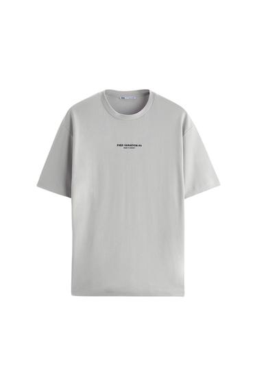 Front view of a grey t-shirt with the text 'FREE VARIATION #8 ROAD TO INFINITY' on the chest.