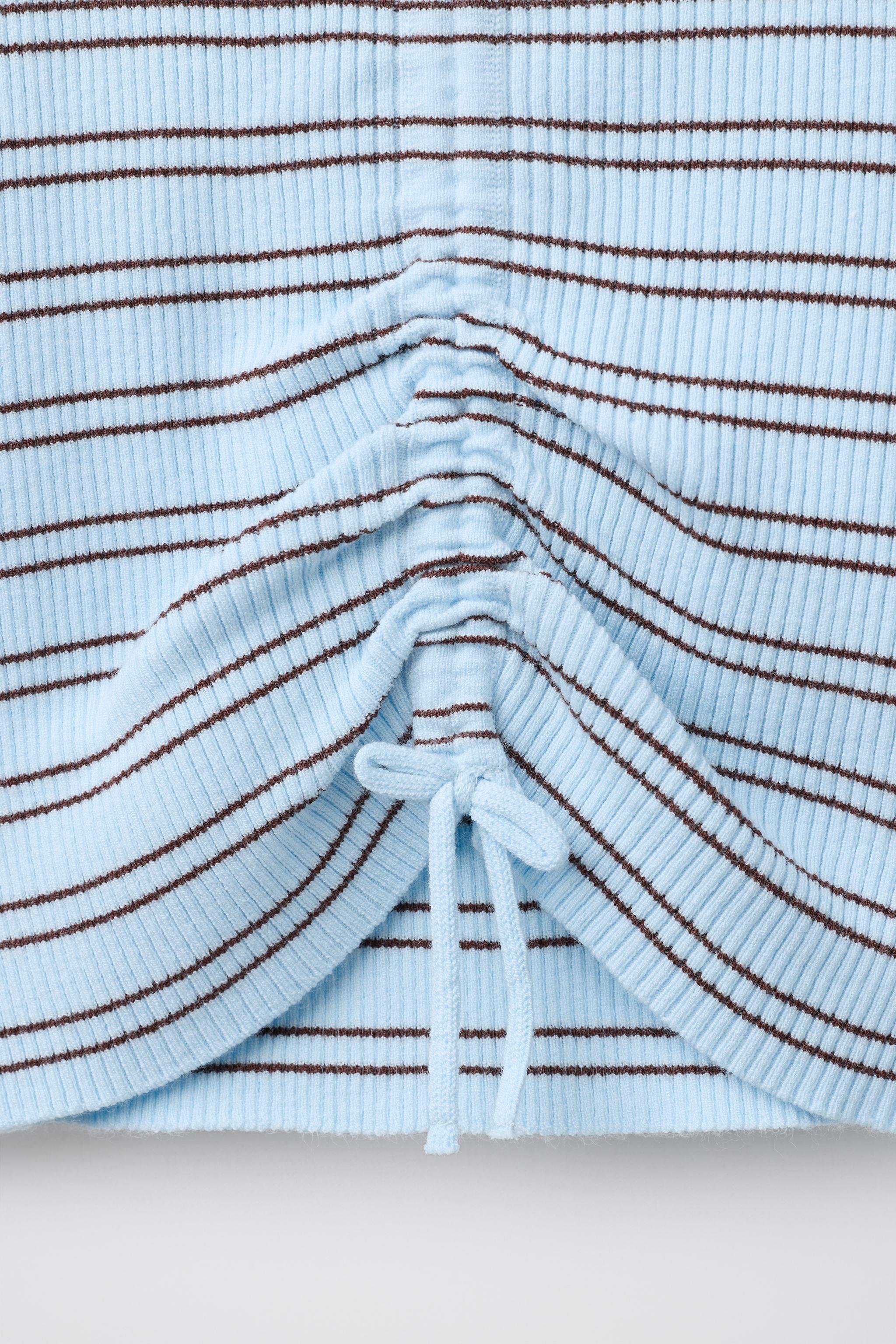 RUFFLED RIBBED JUMPER