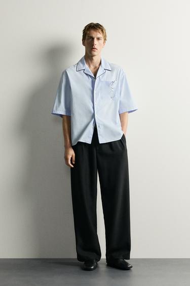 قميص RELAXED FIT ببييه متباين - أزرق سماوى الخاص بـ Zara