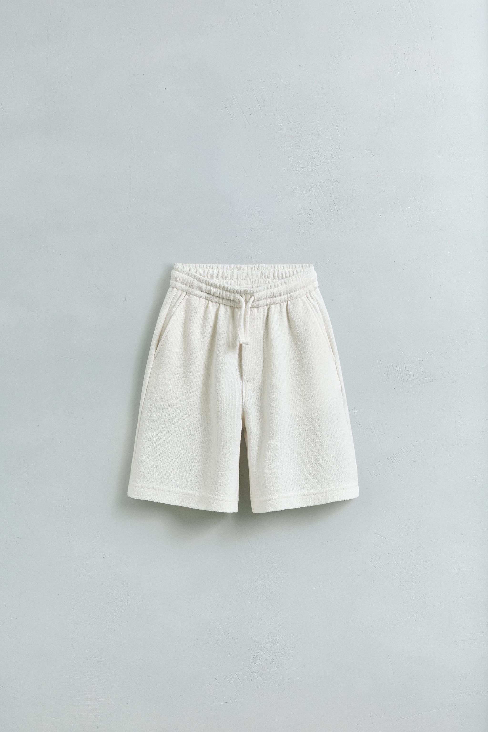 SLIM FIT TEXTURED TOWEL SHORTS