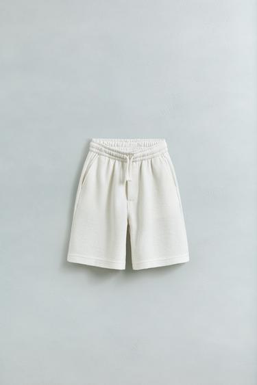 ラスティック スリムフィット パイル地風バミューダパンツエクリュZaraのラスティック スリムフィット パイル地風バミューダパンツ - エクリュ 