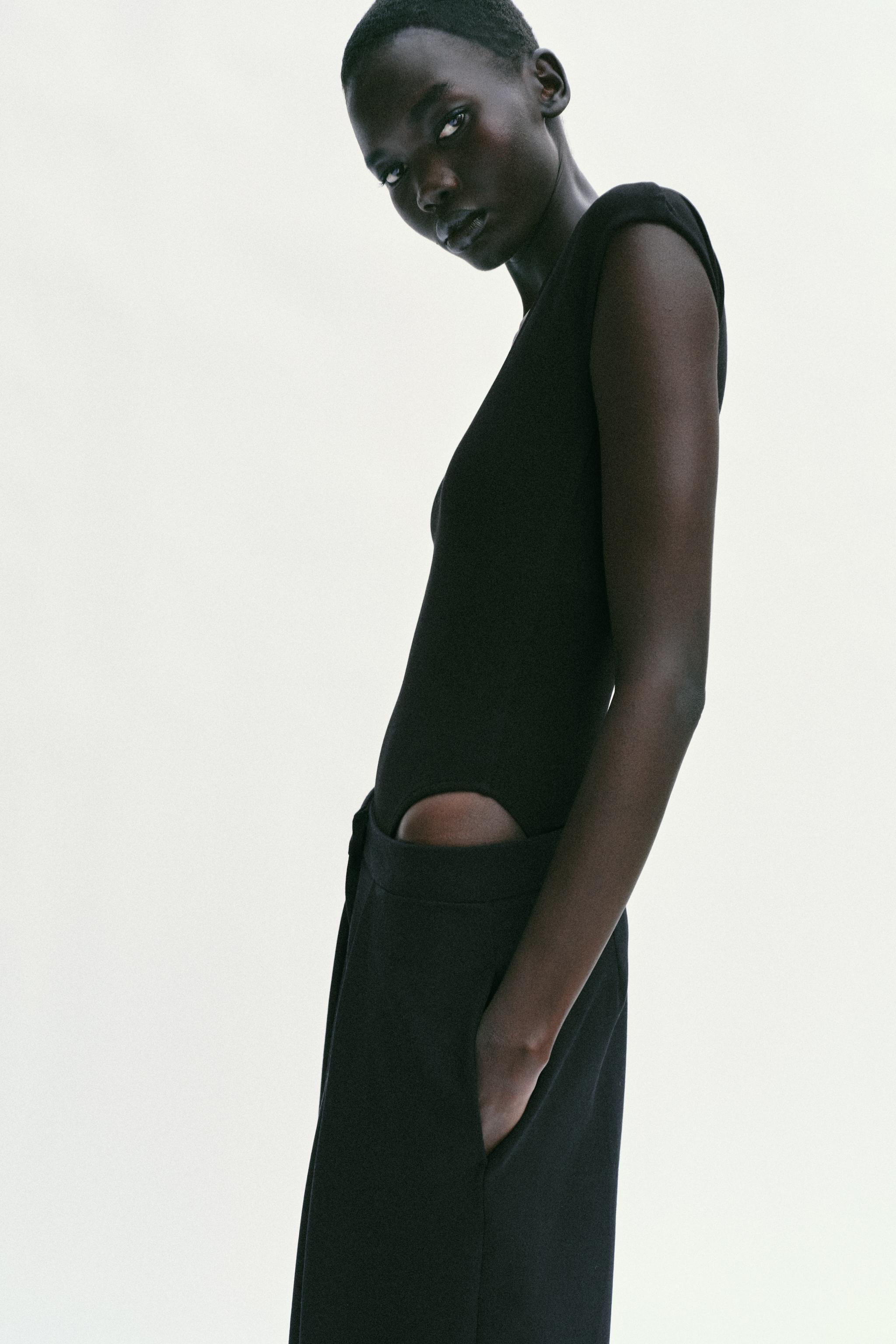 ROUND NECK BODYSUIT