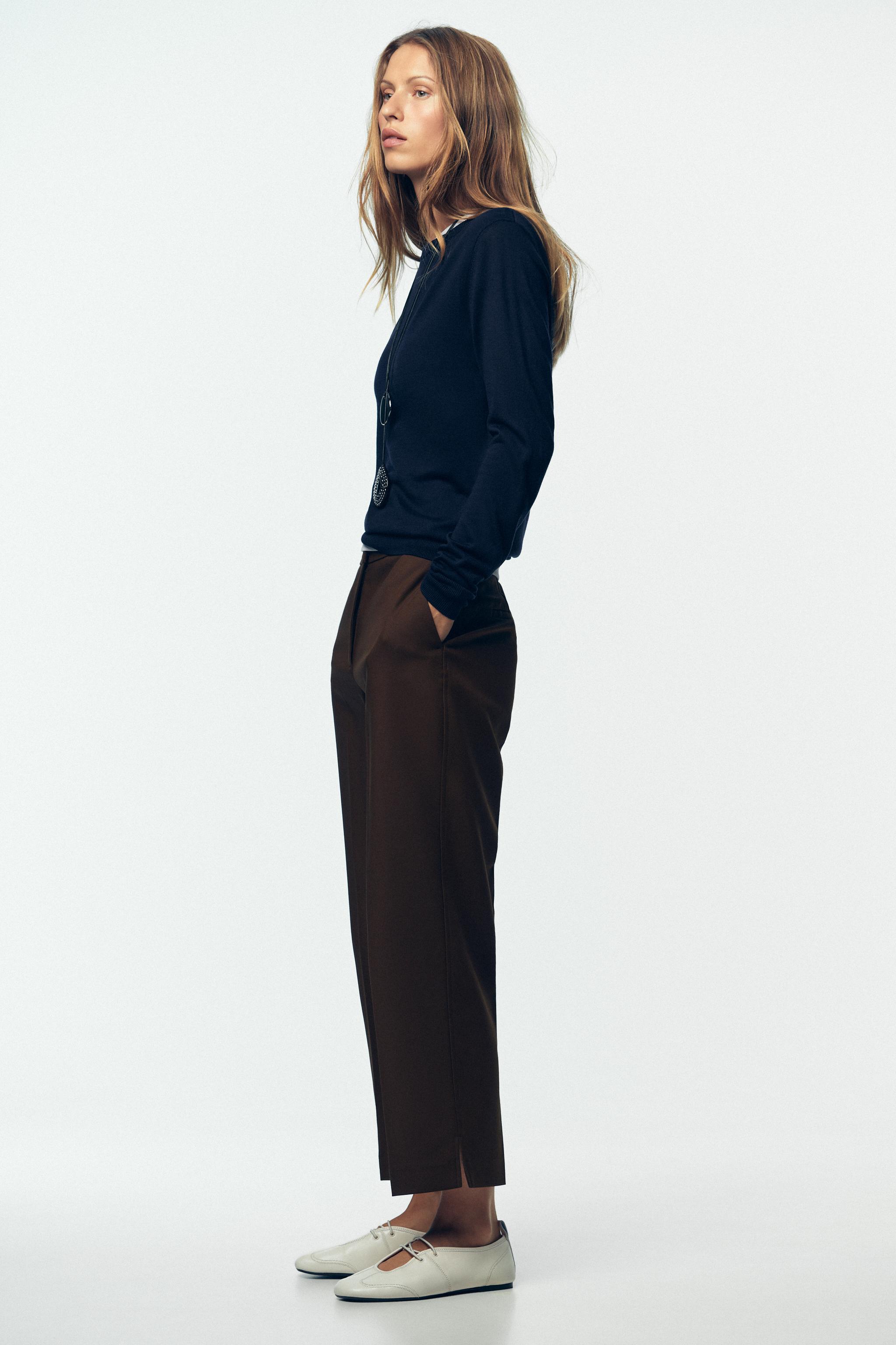 PANTS WITH SLIT HEMS