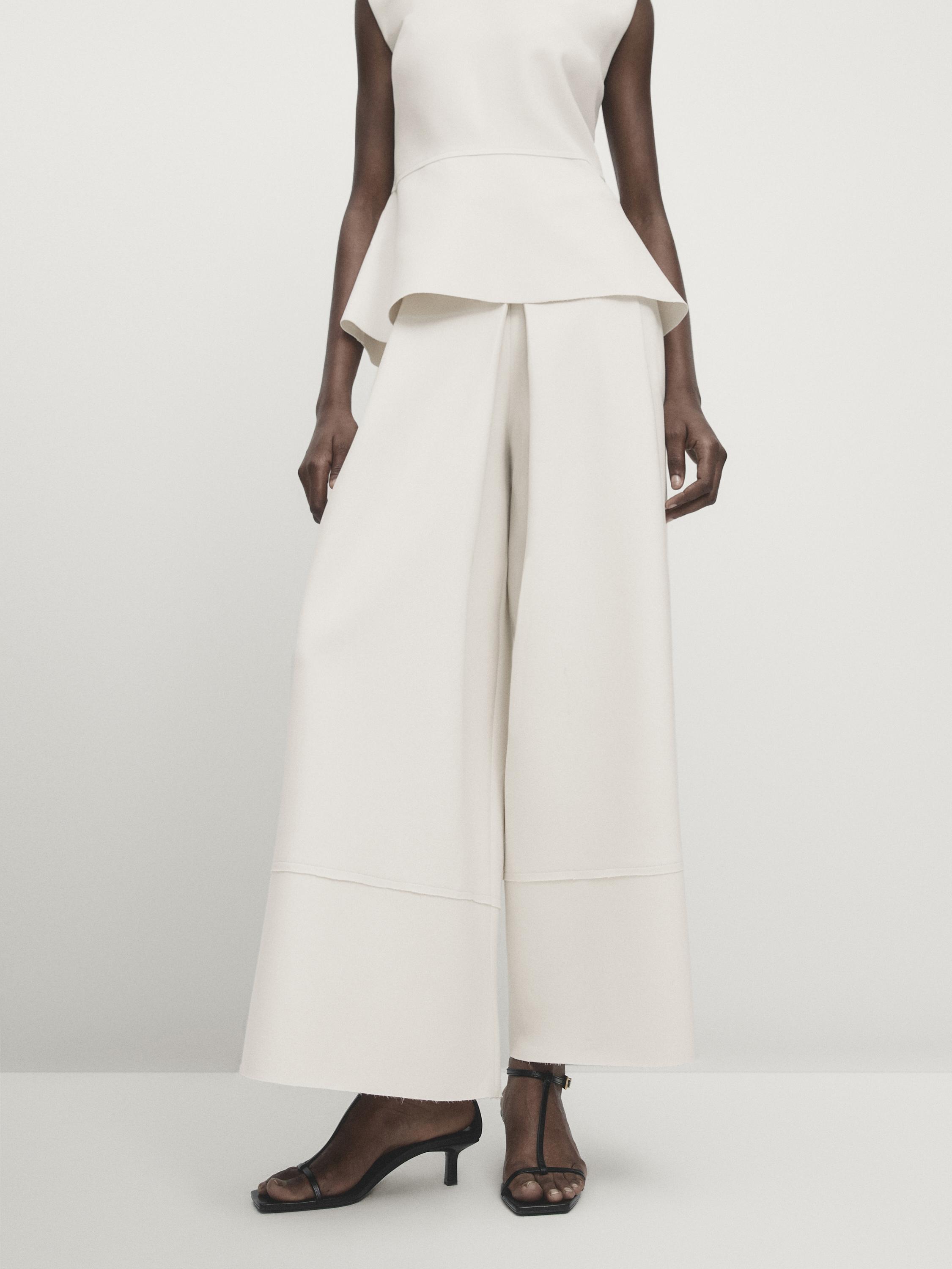 Wide-leg trousers with darts and hem seam detail - Studio