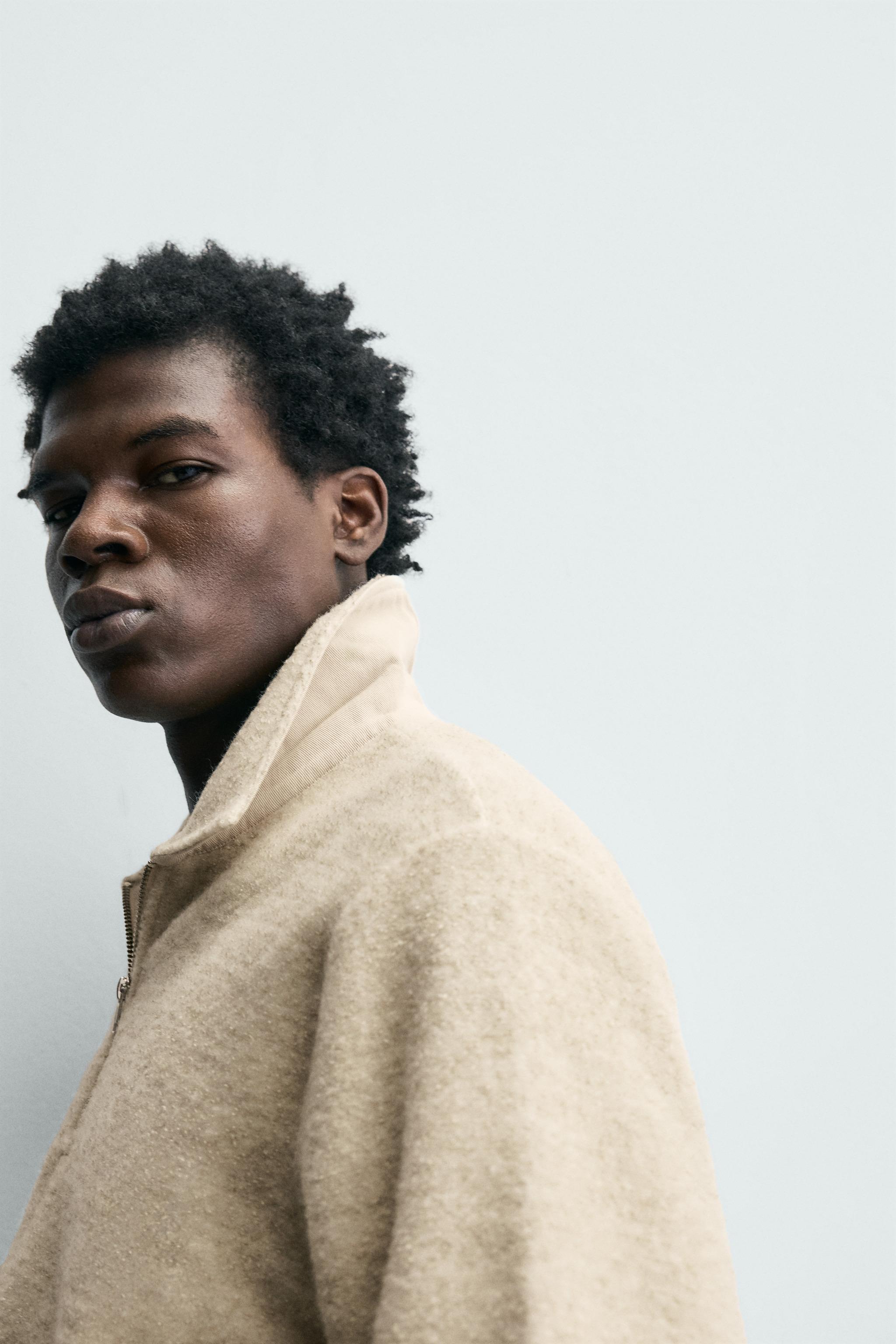 TEXTURED QUARTER-ZIP SWEATSHIRT